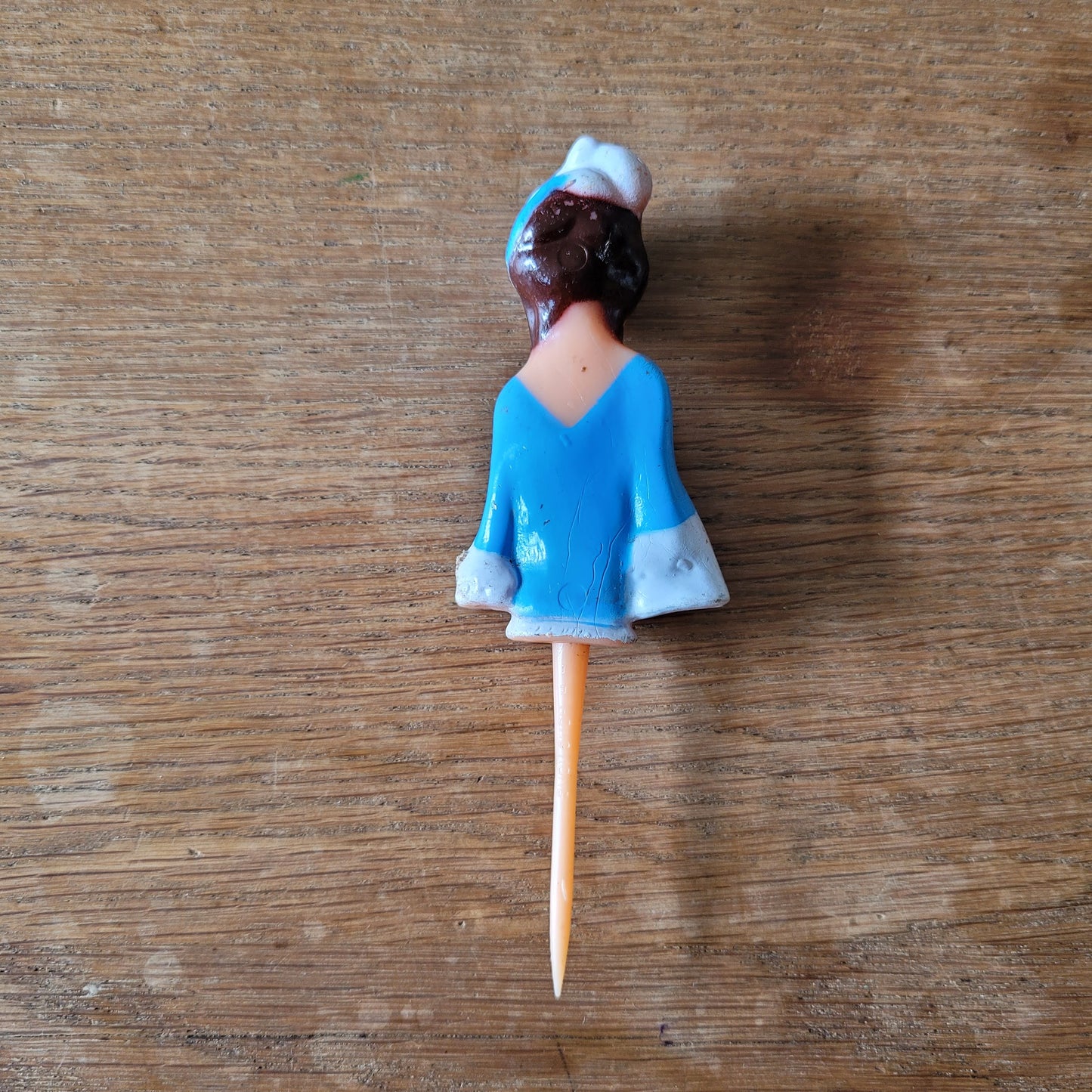 Vintage celluloid lady cake topper