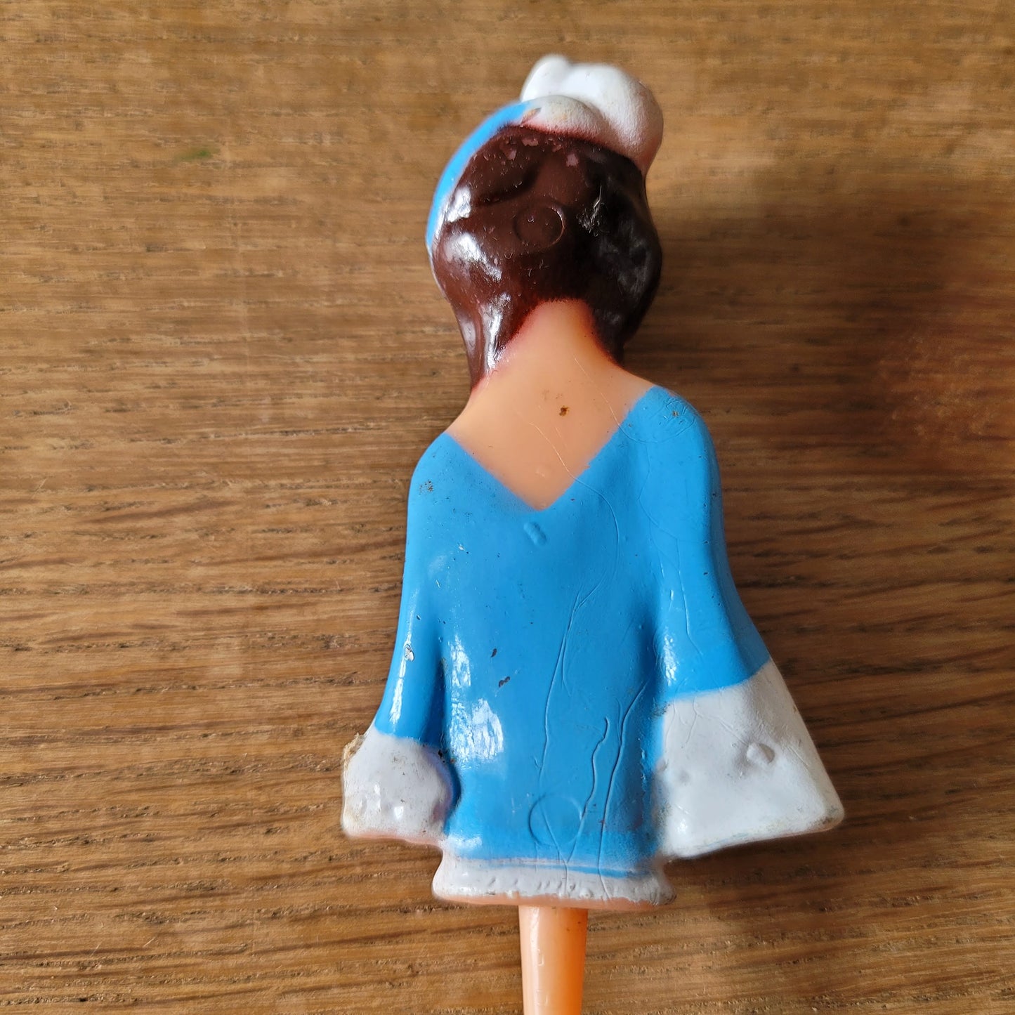 Vintage celluloid lady cake topper