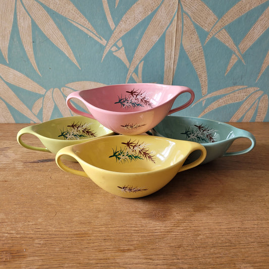 Set of four 1950s James Kent Ltd Oregon Pine twin-handled soup bowls in four colourways