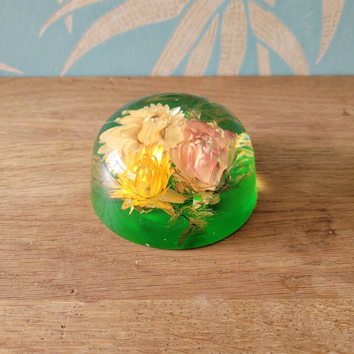 1970s flower filled acrylic paperweight