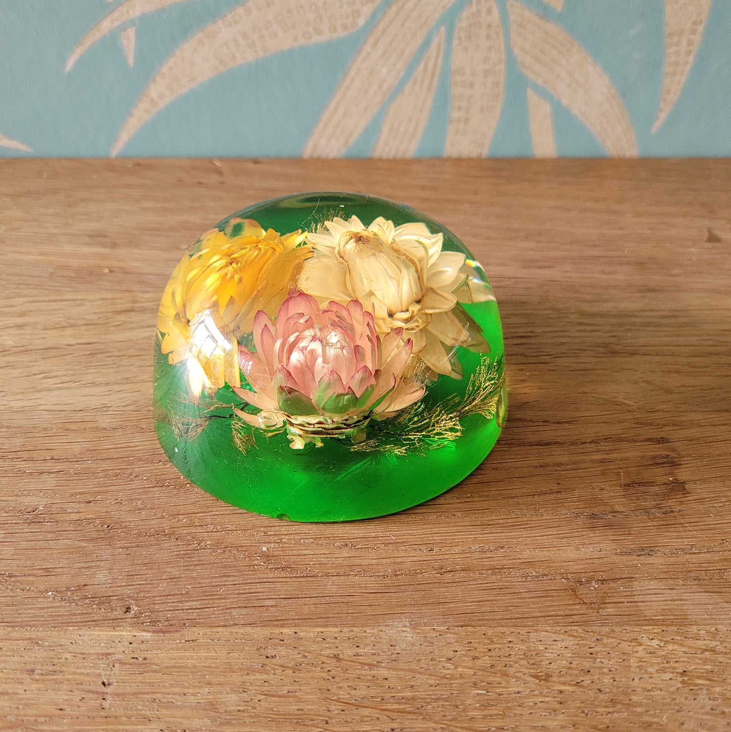 1970s flower filled acrylic paperweight