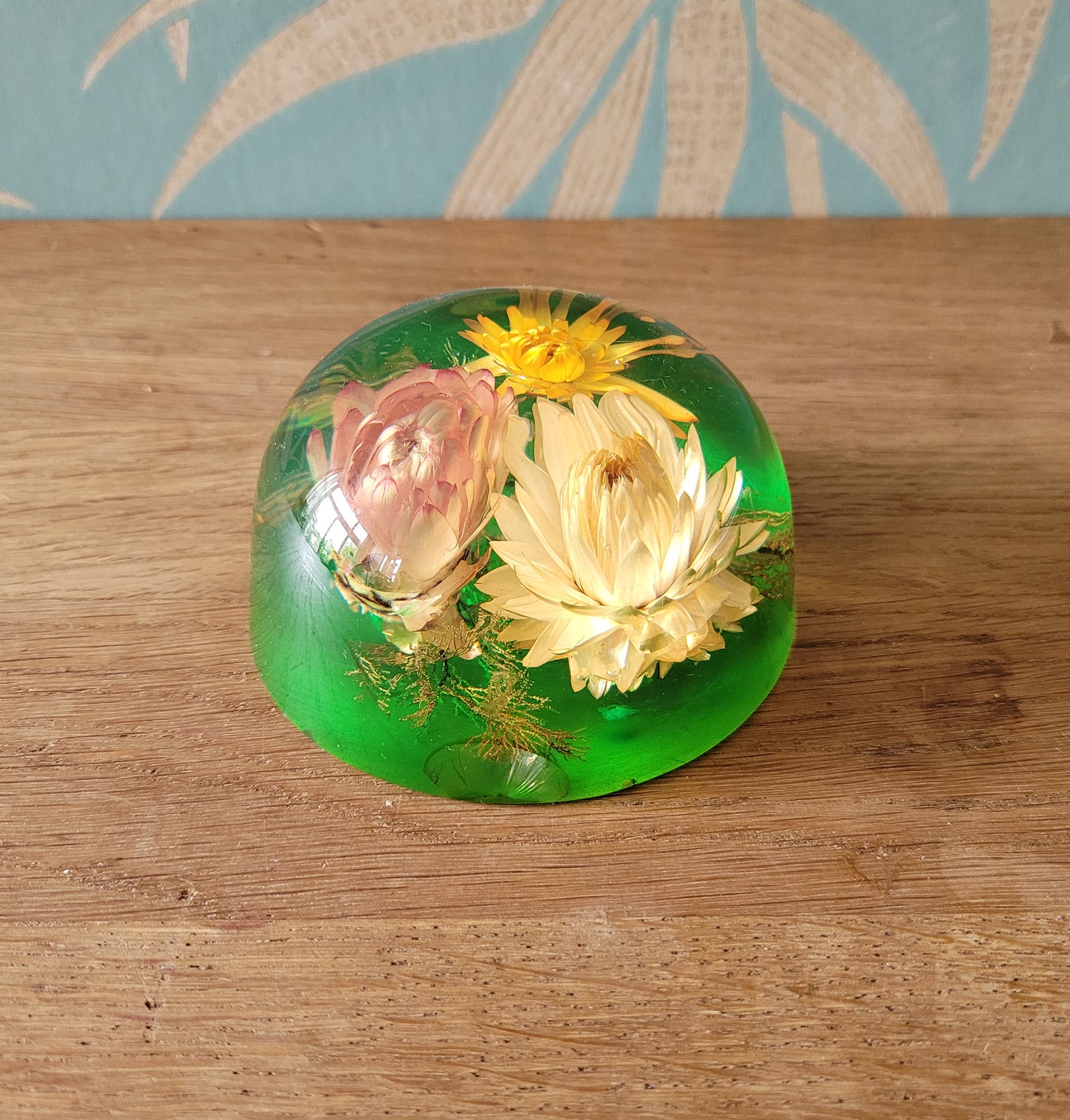 1970s flower filled acrylic paperweight