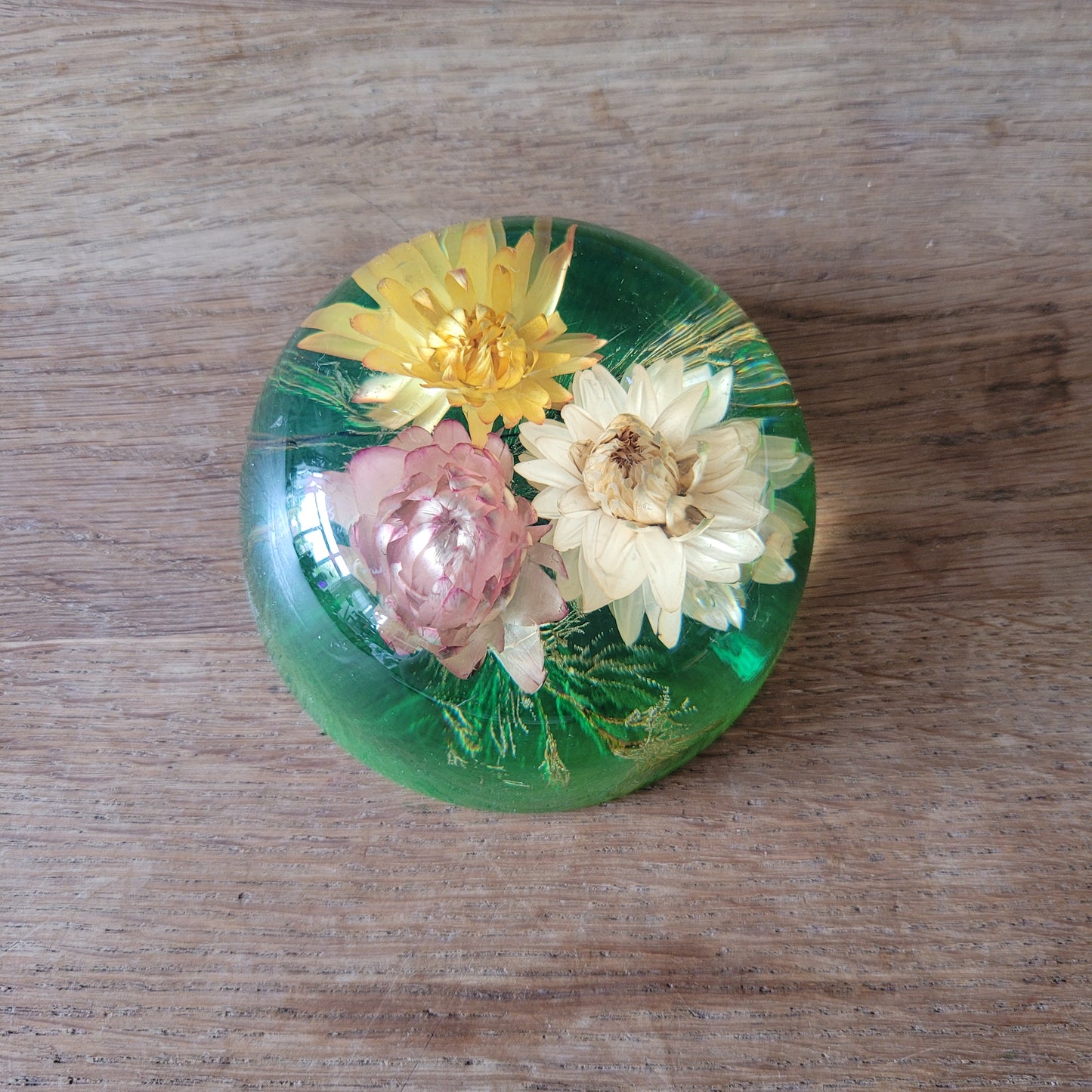 1970s flower filled acrylic paperweight