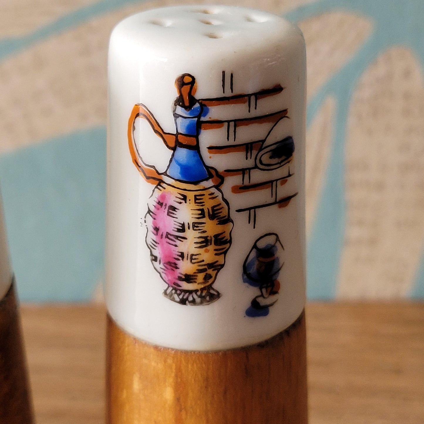 1960s wood & ceramic salt and pepper set with kitsch wine jug illustration