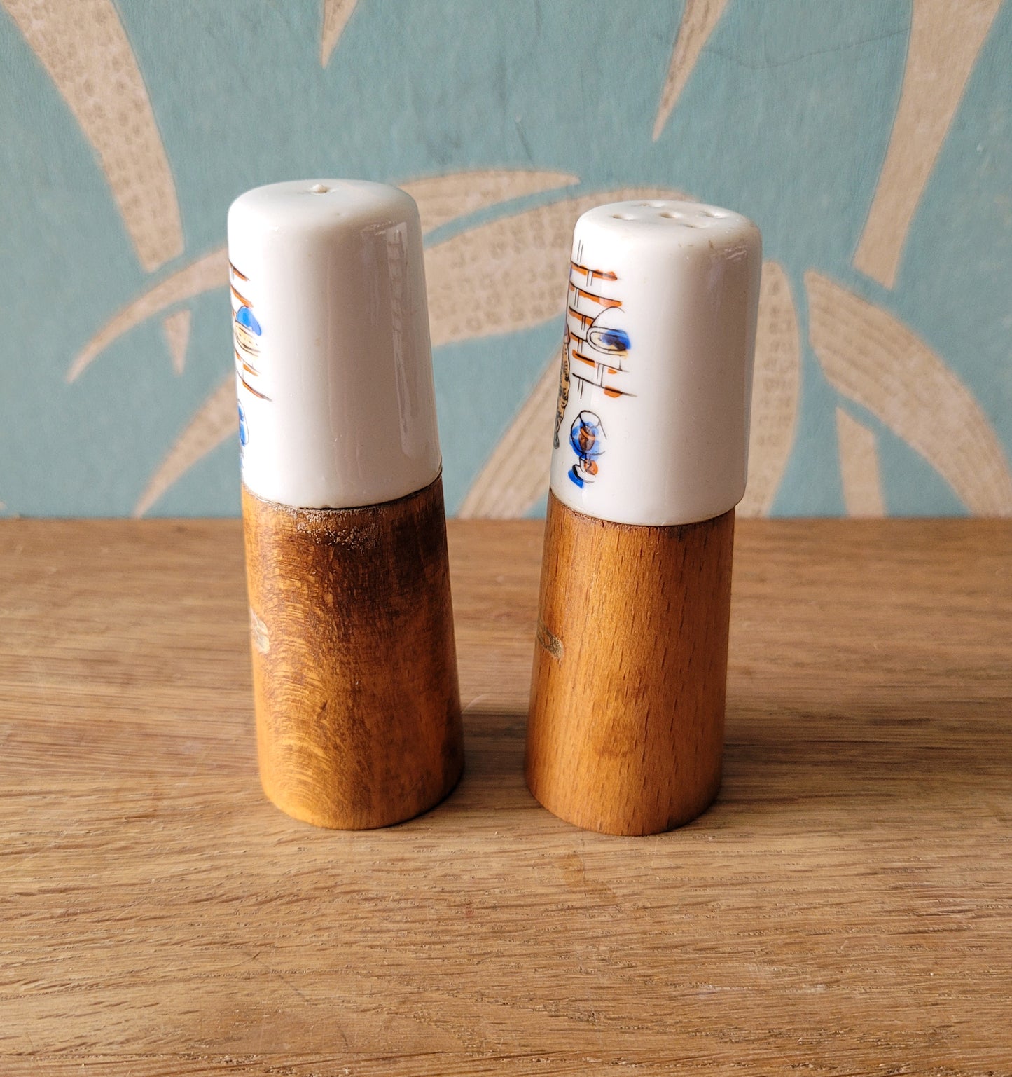 1960s wood & ceramic salt and pepper set with kitsch wine jug illustration