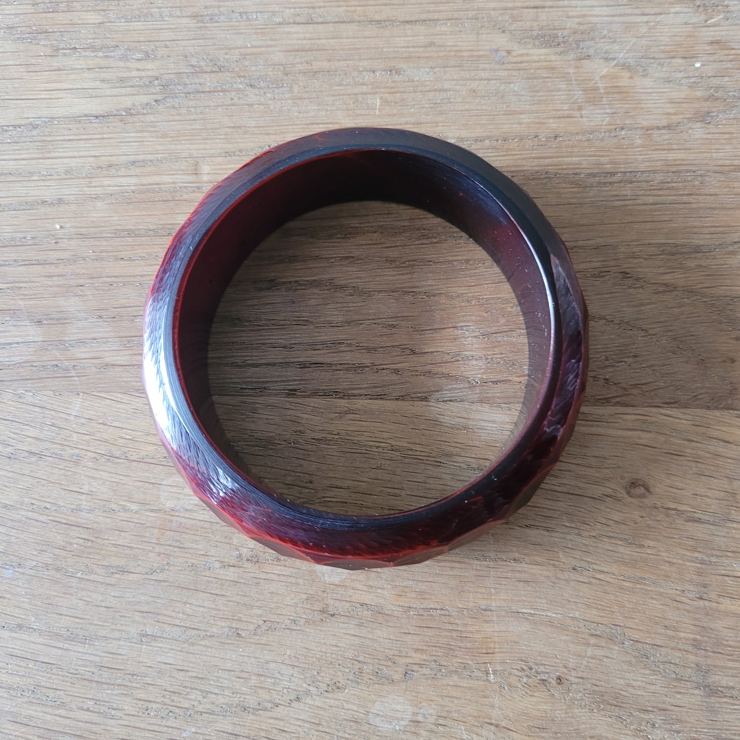 1970s deep red carved lucite faceted bangle