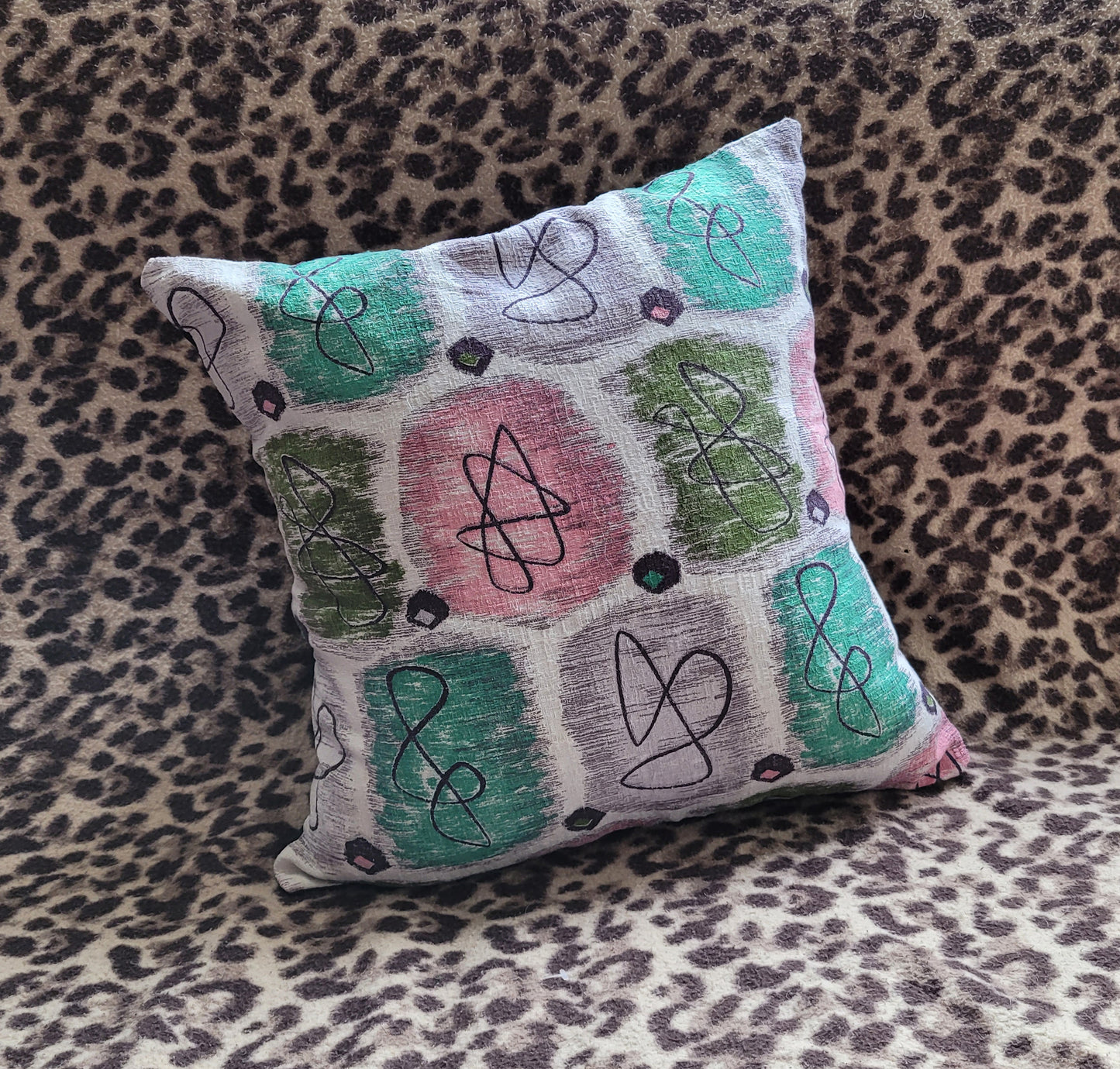 Home-made 1950s pink & green atomic barkcloth cushion cover with contrast black reverse