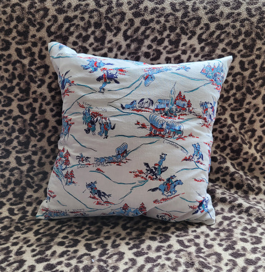 Home-made mid-century wagon trail/Wild West pattern cushion cover with same pattern reverse