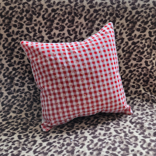 Home-made vintage red & white Gingham cushion cover with allover daisy motif and contrast white reverse