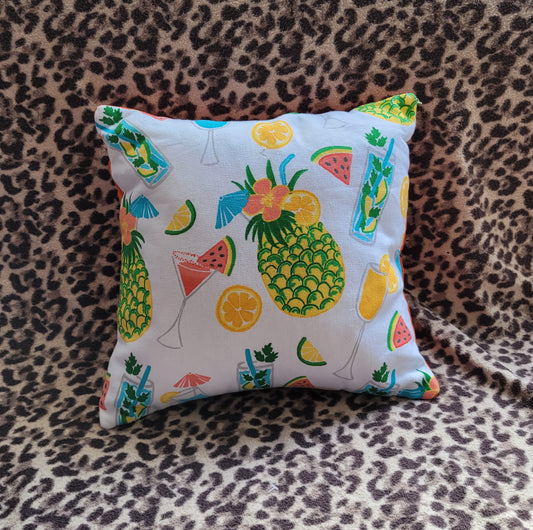 Home-made retro tropical cocktail print cushion cover with contrast orange reverse