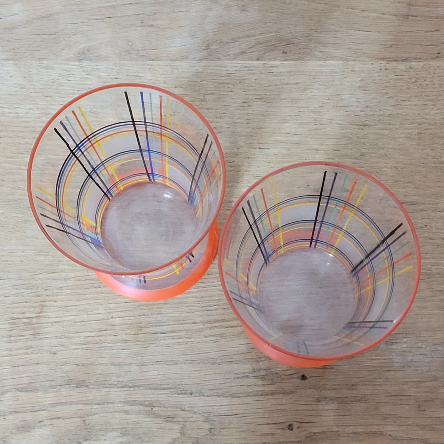 Pair of 1960s atomic plaid / spaghetti stripe drinking glasses
