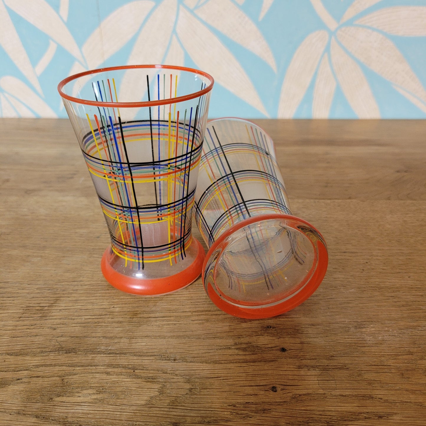 Pair of 1960s atomic plaid / spaghetti stripe drinking glasses