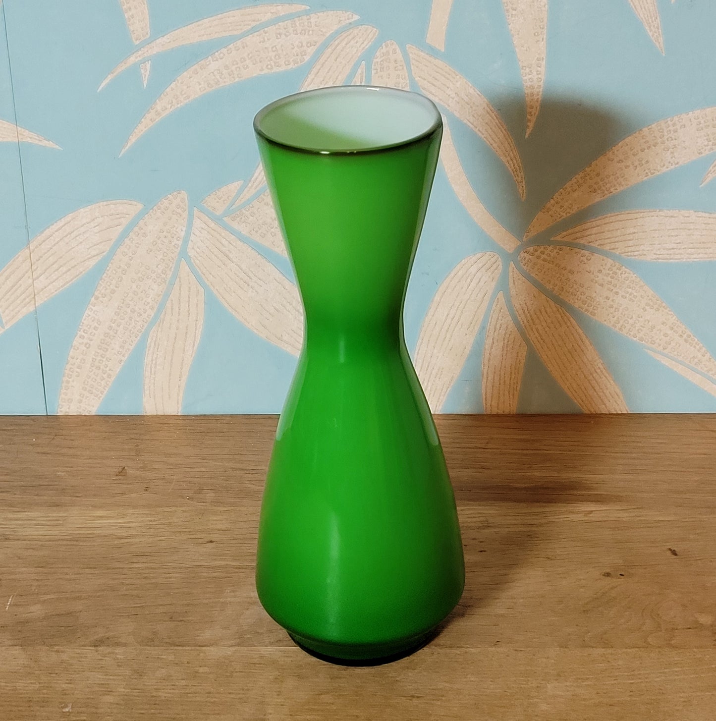 Set of three 1960s/70s Scandinavian-style green cased glass waisted vases