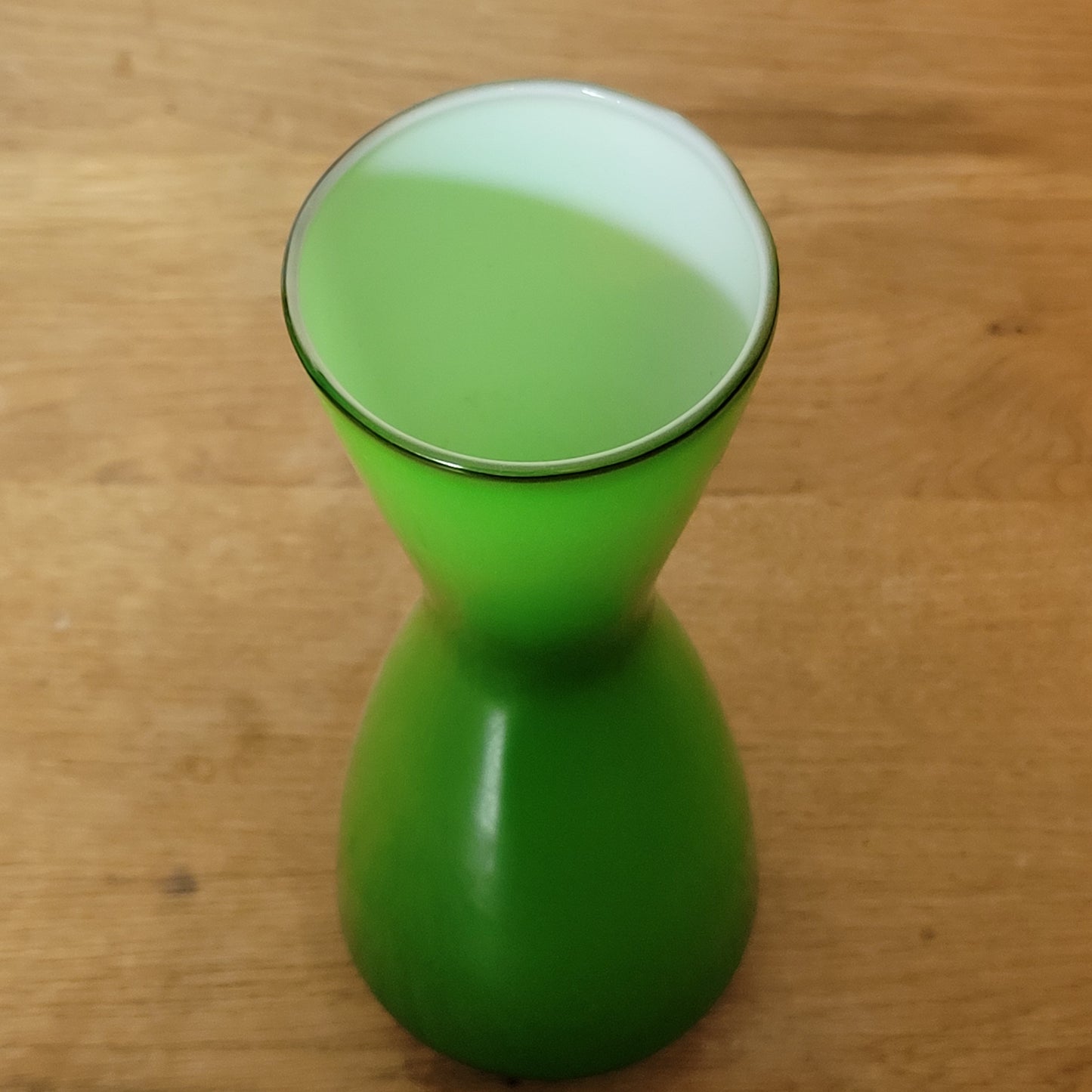 Set of three 1960s/70s Scandinavian-style green cased glass waisted vases