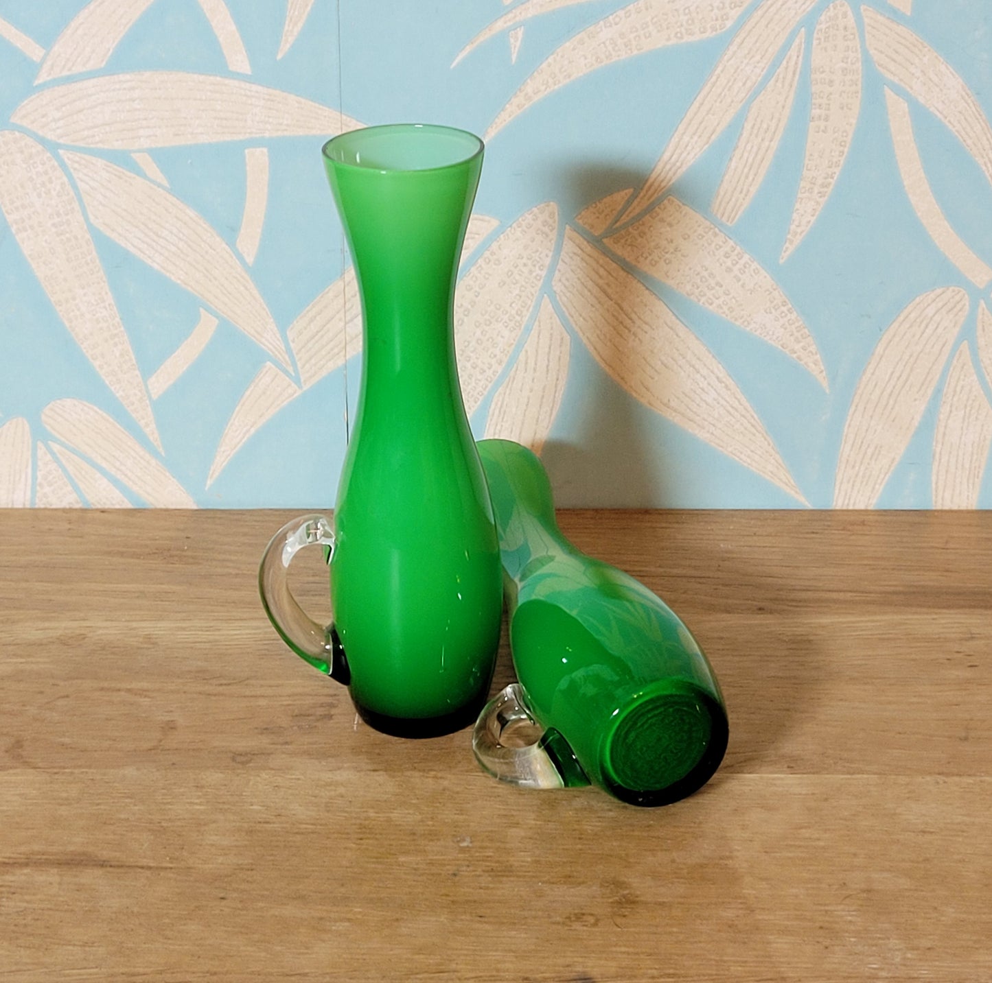 Set of three 1960s/70s Scandinavian-style green cased glass waisted vases