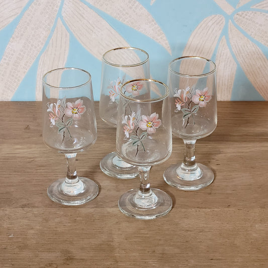 Set of four 1970s floral sherry glasses with gilt rims