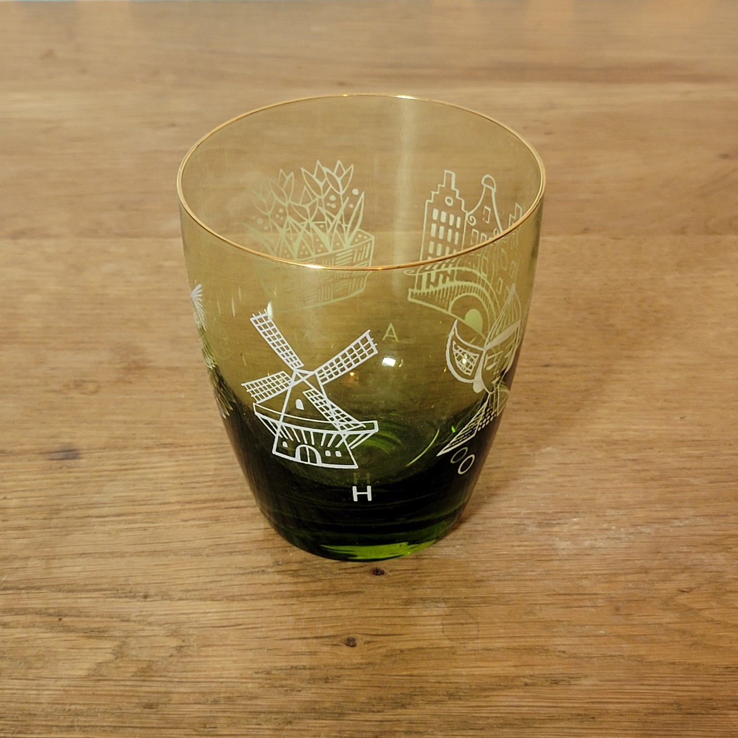 1960s olive green glass tumbler with Dutch scene print