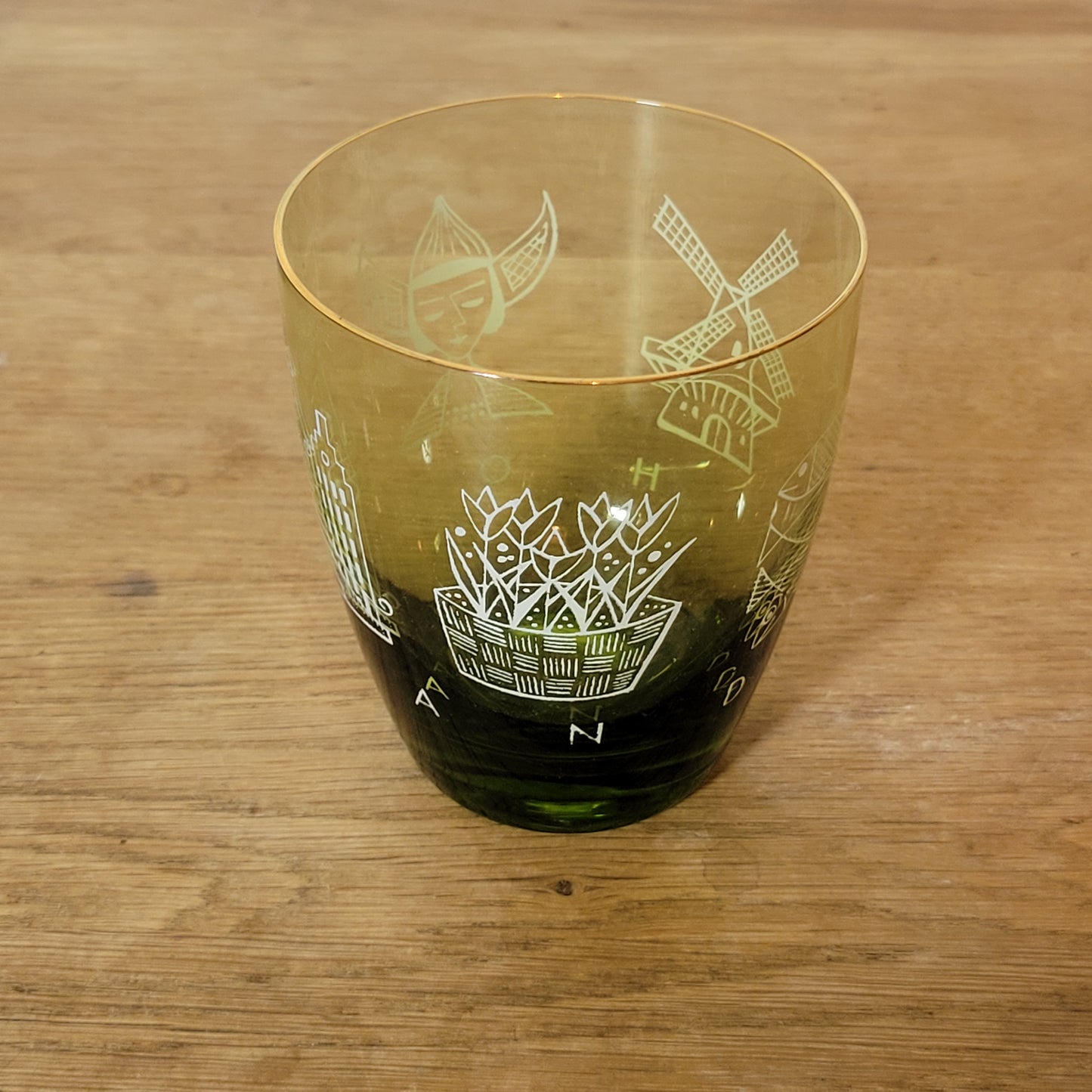 1960s olive green glass tumbler with Dutch scene print