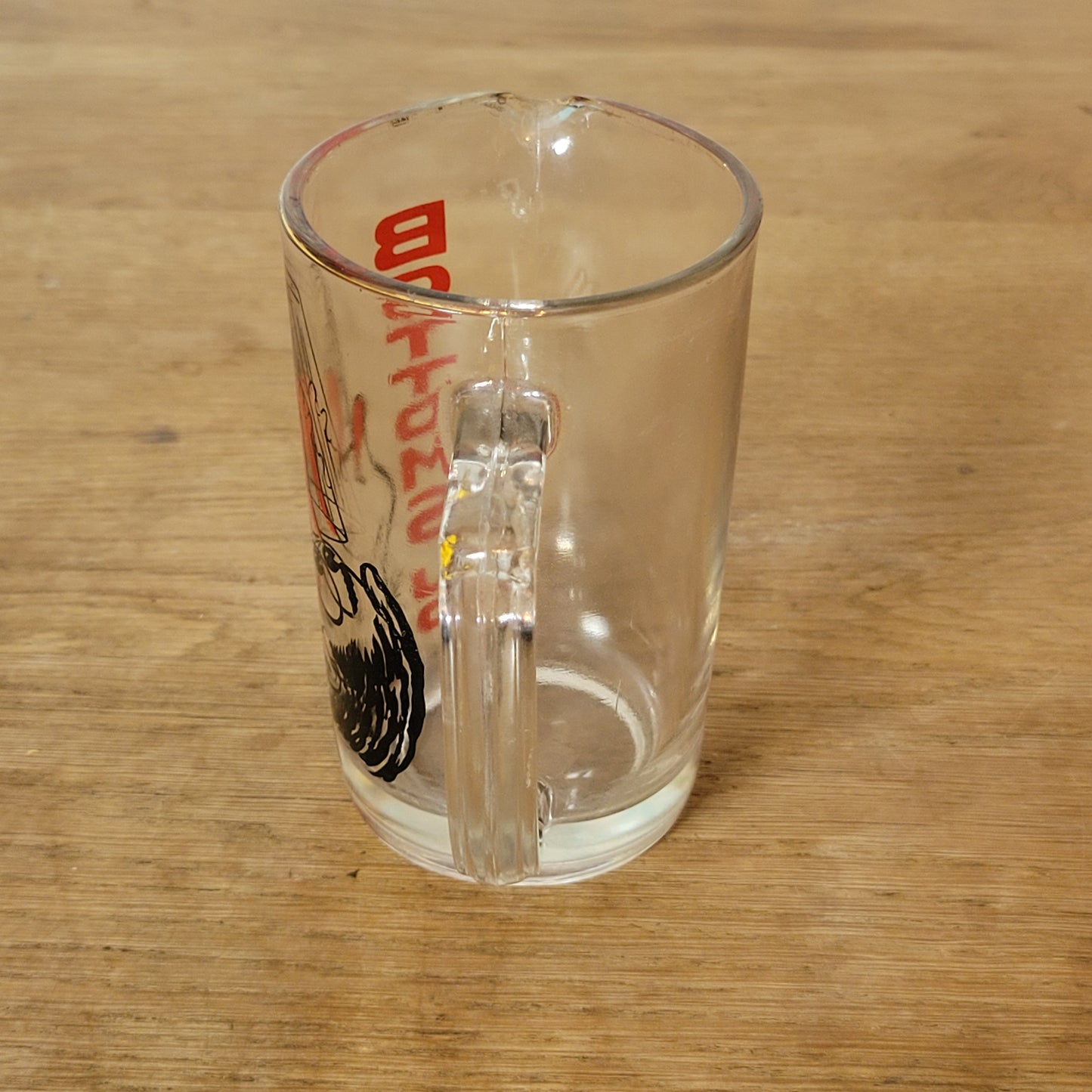 Mid-century ‘Bottoms Up’ glass cocktail mixer jug with drunken man design