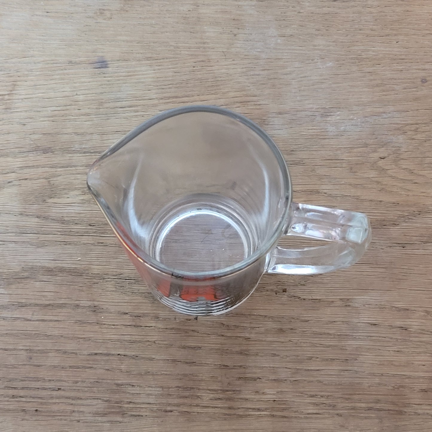 Mid-century ‘Bottoms Up’ glass cocktail mixer jug with drunken man design