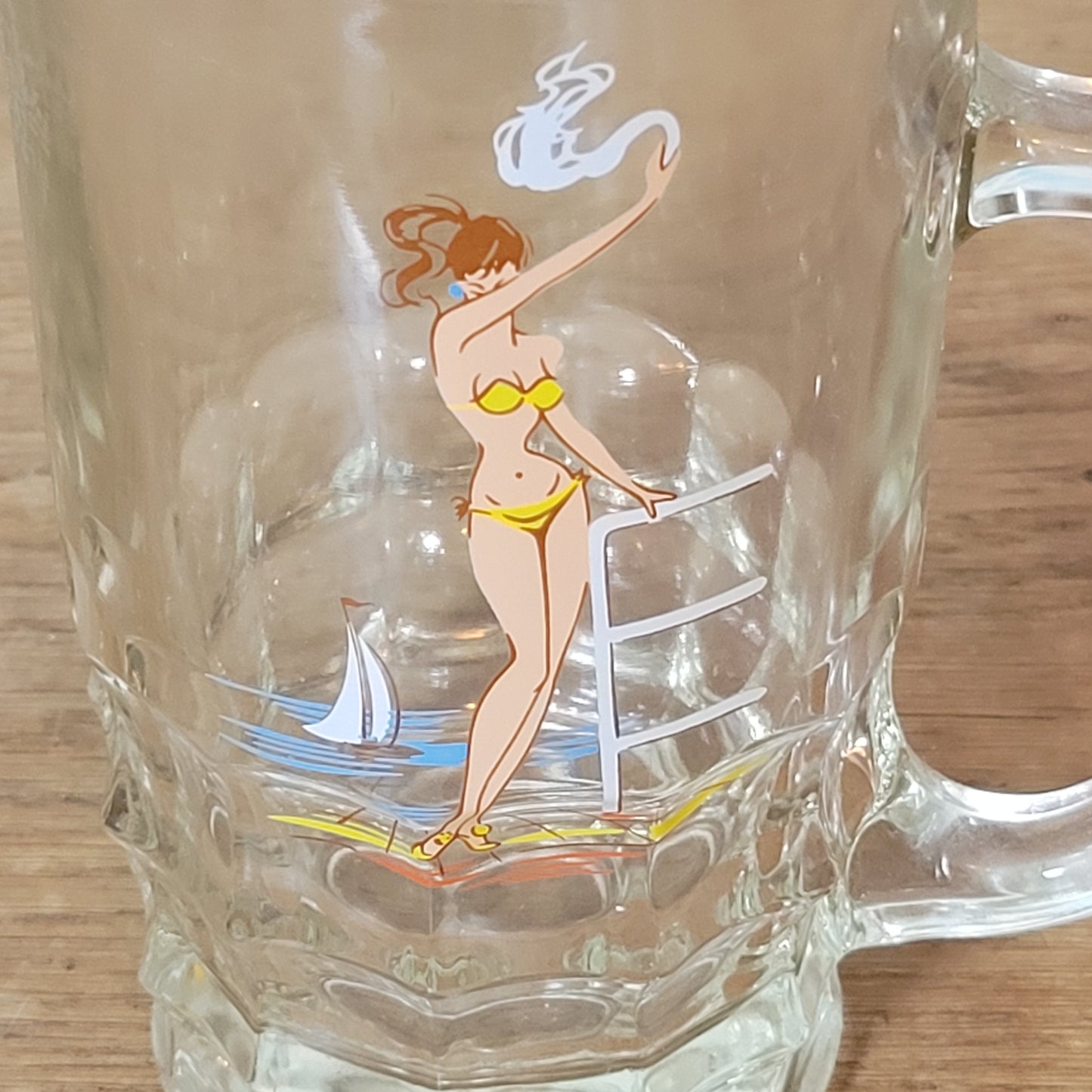 1960s cheeky glass beer stein with bikini pin-up