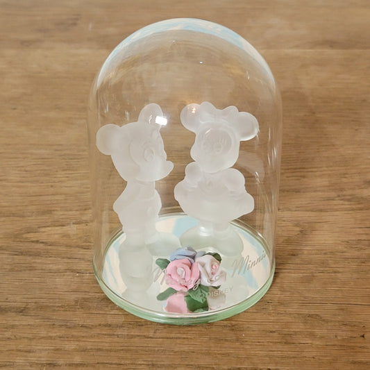Collectable Disney frosted glass Minnie & Mickey Mouse figurines displayed under glass cloche