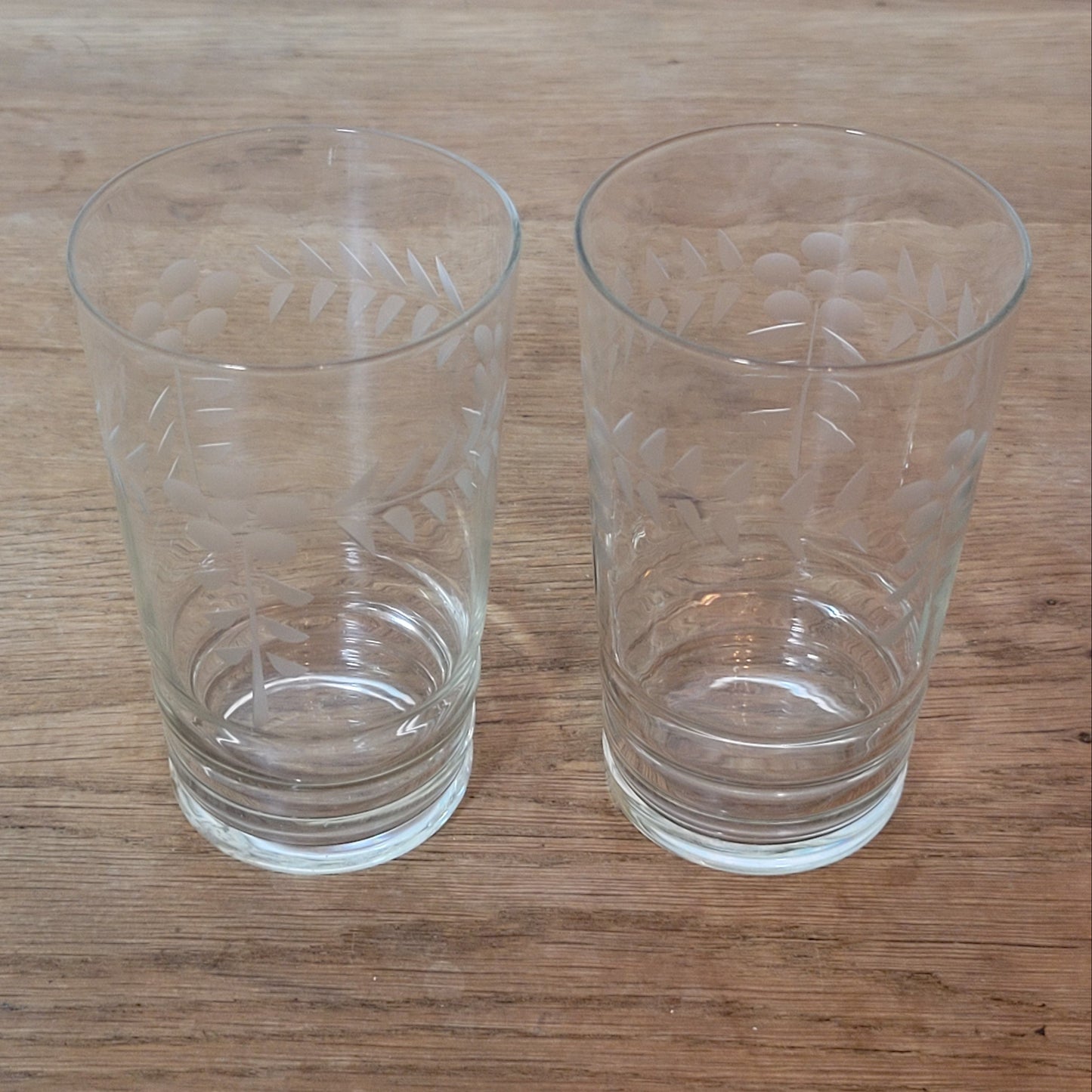 Pair of 1950s/60s cut glass water tumblers with leaf & berry design