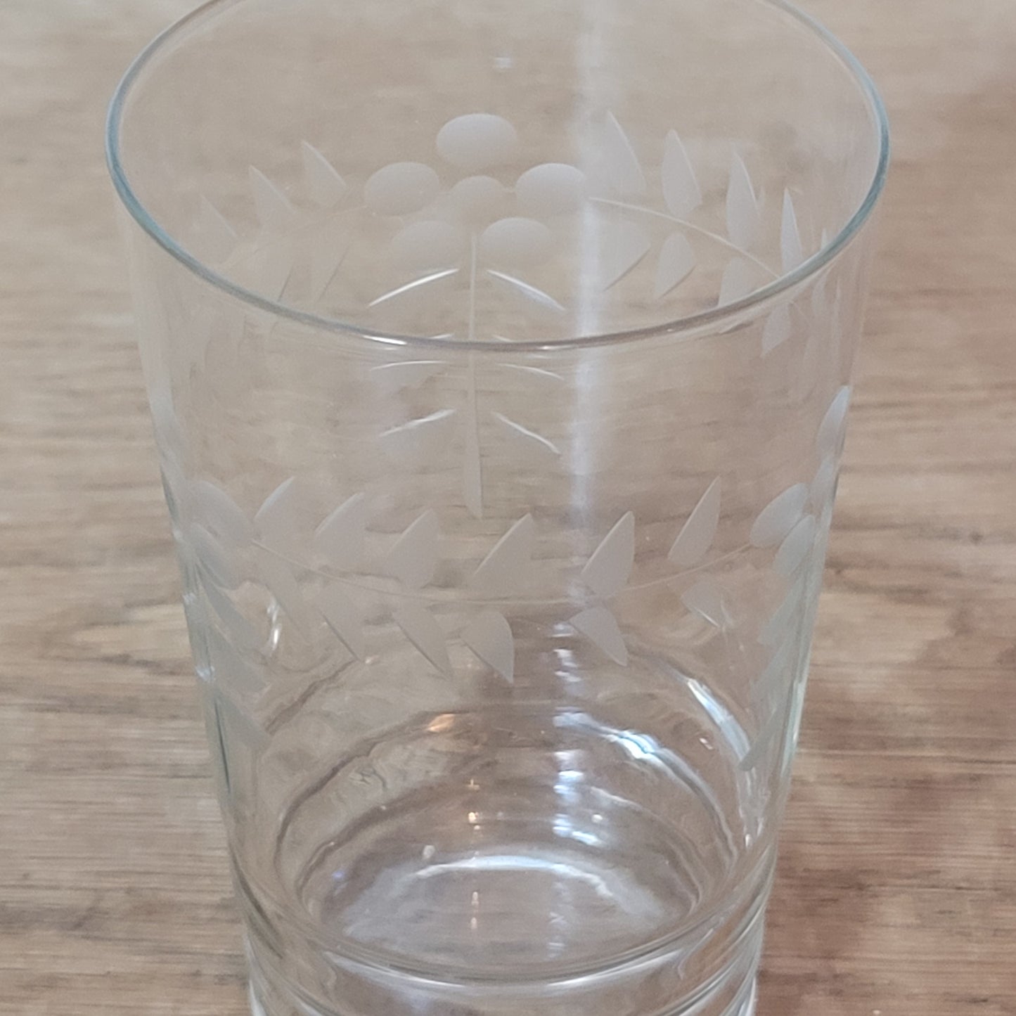 Pair of 1950s/60s cut glass water tumblers with leaf & berry design