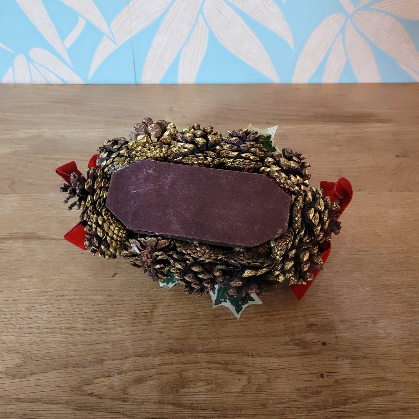 Vintage festive pine cone & red ribbon candleholder centrepiece
