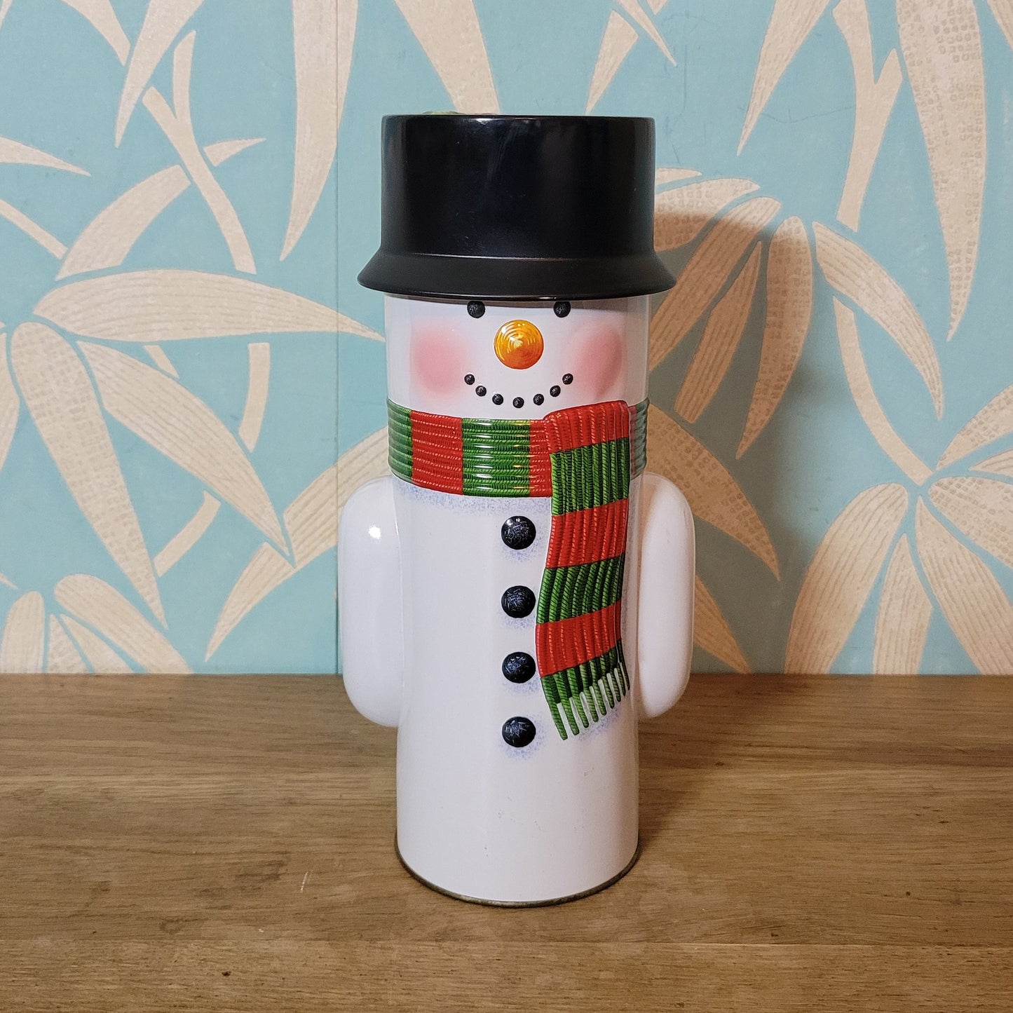 Retro snowman candy tin, empty
