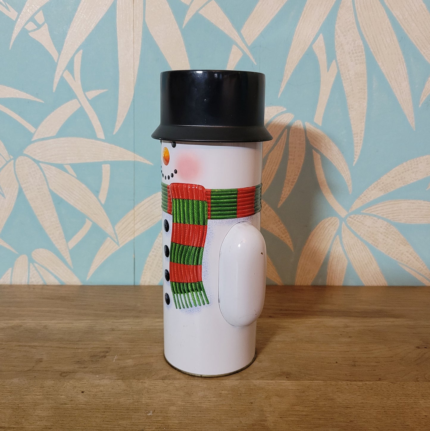Retro snowman candy tin, empty