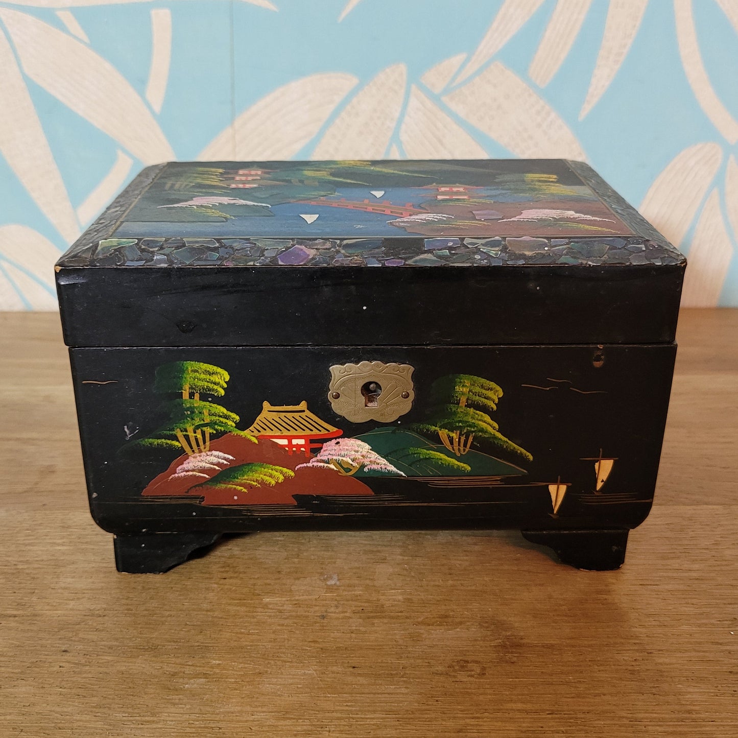 1950s black laquered Japanese multi-compartment musical jewellery box, with iternal hand-painted mirror