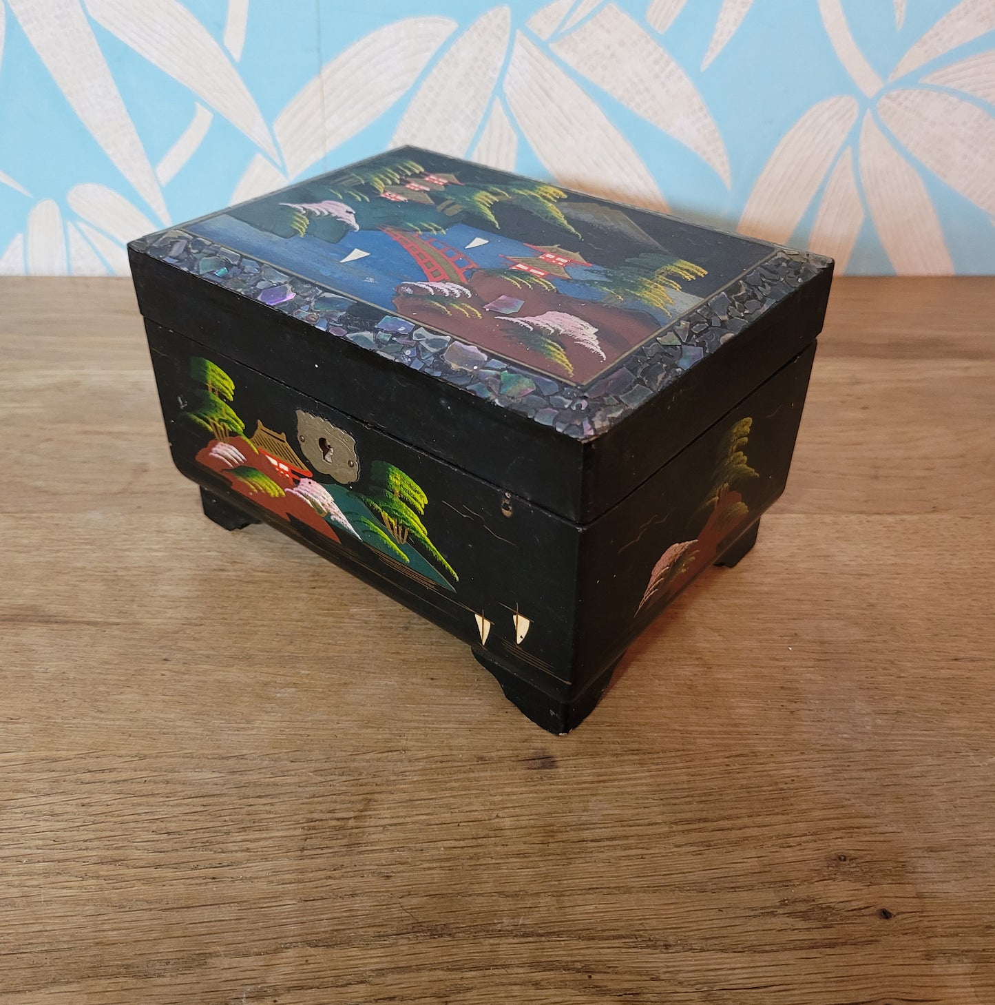 1950s black laquered Japanese multi-compartment musical jewellery box, with iternal hand-painted mirror