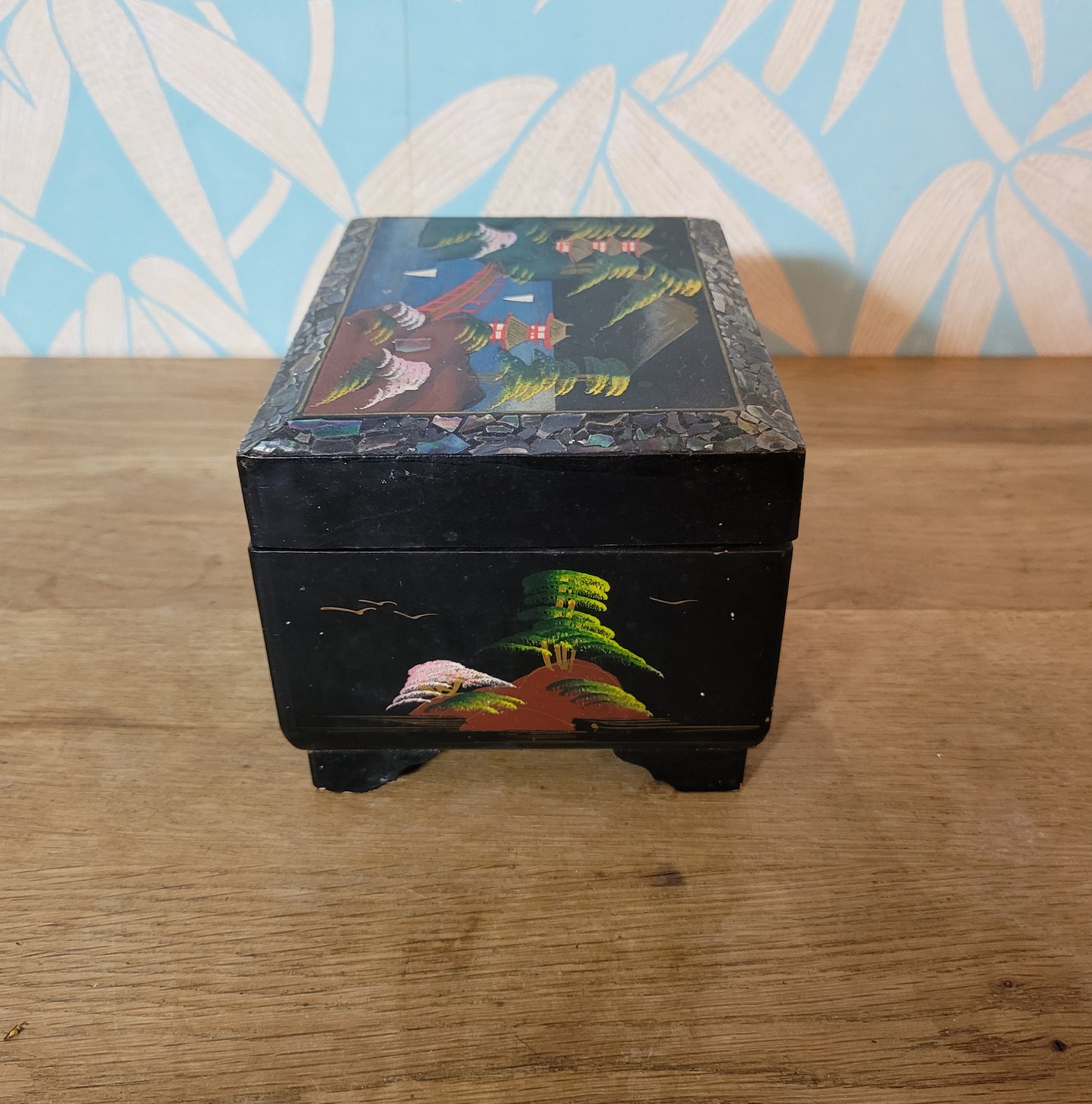 1950s black laquered Japanese multi-compartment musical jewellery box, with iternal hand-painted mirror