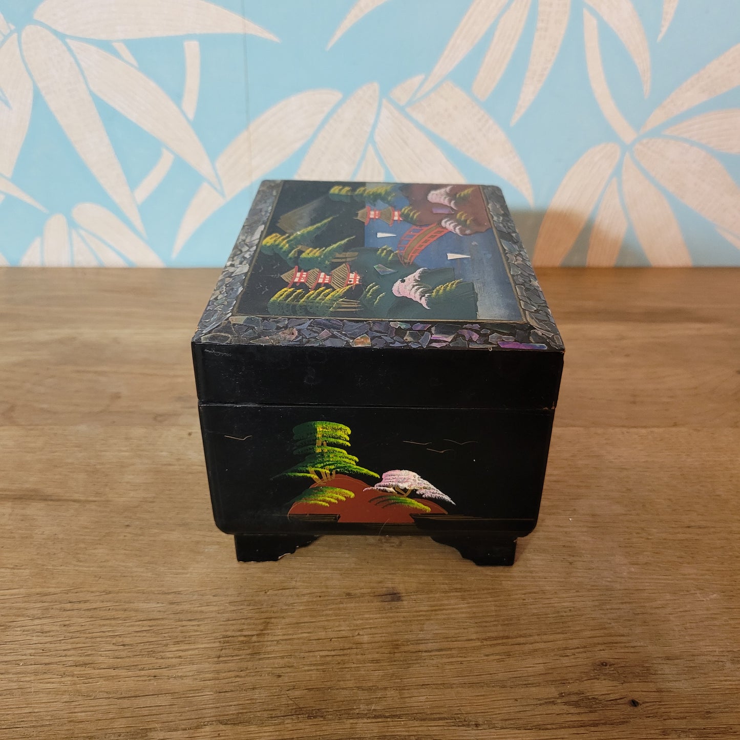 1950s black laquered Japanese multi-compartment musical jewellery box, with iternal hand-painted mirror