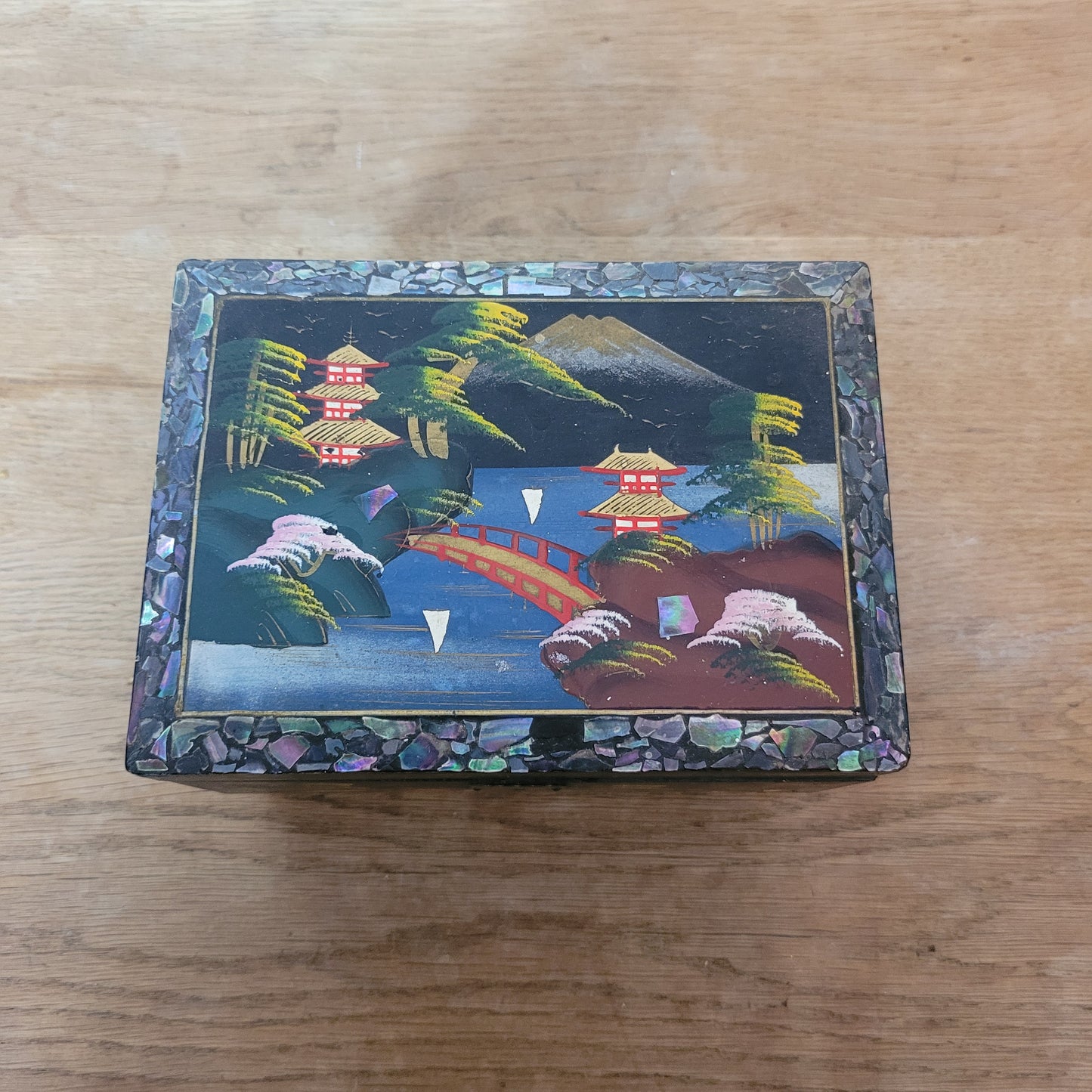 1950s black laquered Japanese multi-compartment musical jewellery box, with iternal hand-painted mirror