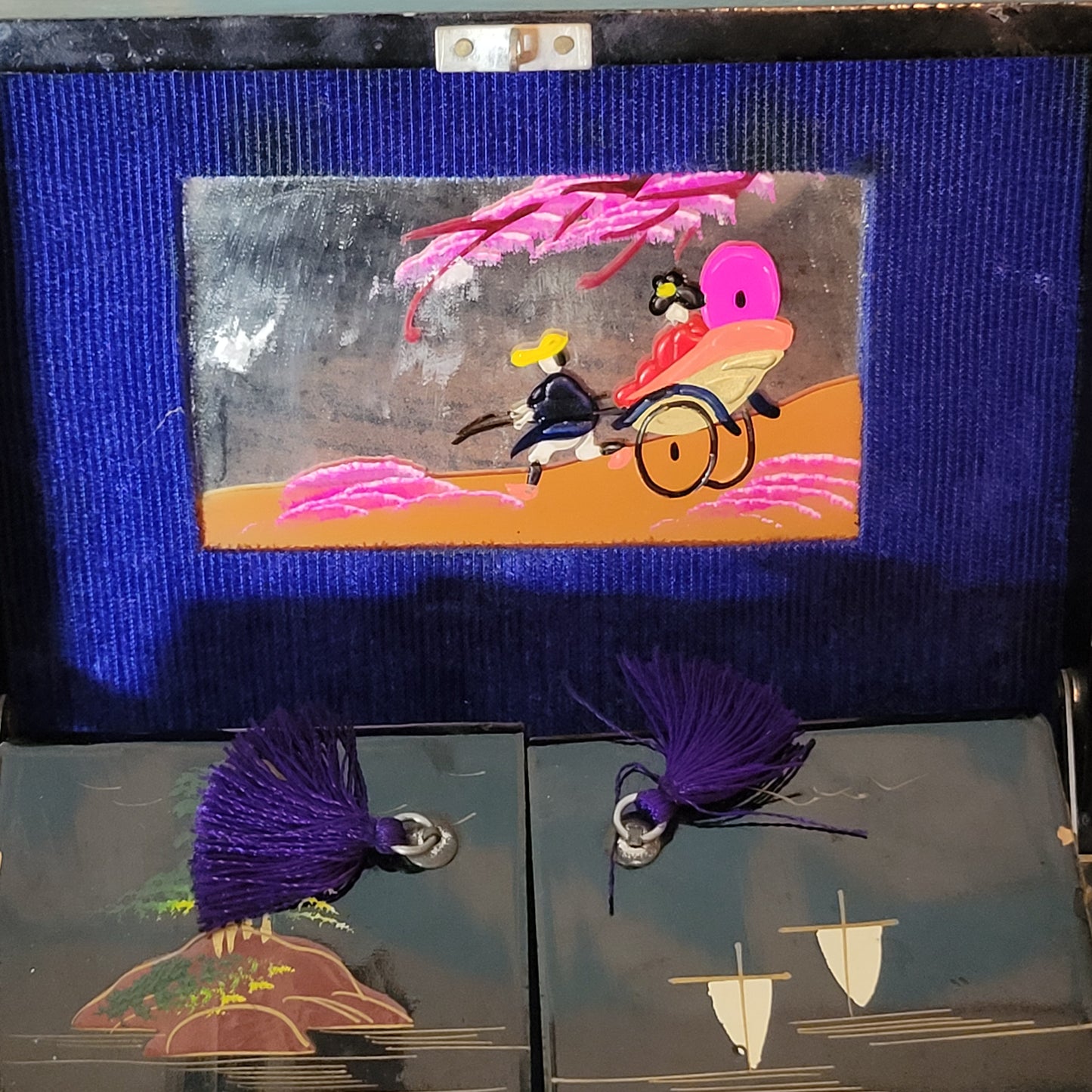 1950s black laquered Japanese multi-compartment musical jewellery box, with iternal hand-painted mirror