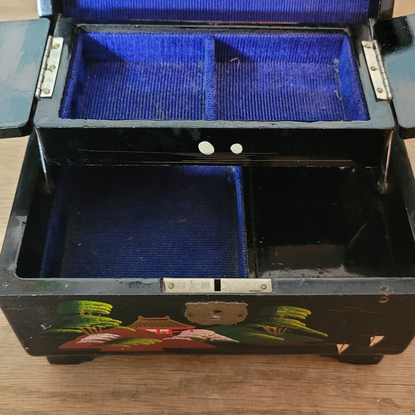 1950s black laquered Japanese multi-compartment musical jewellery box, with iternal hand-painted mirror