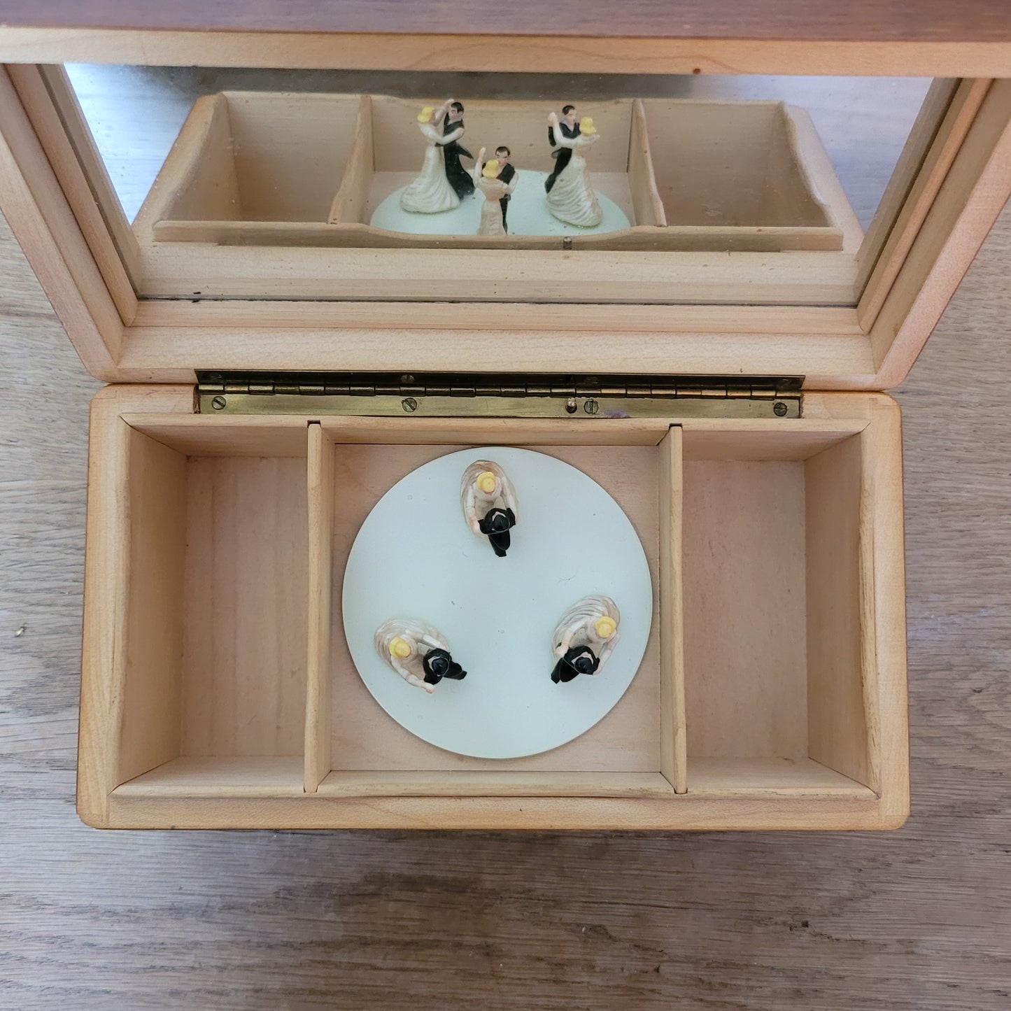 Vintage wooden musical cigarette box with three pirouetting dancing couples