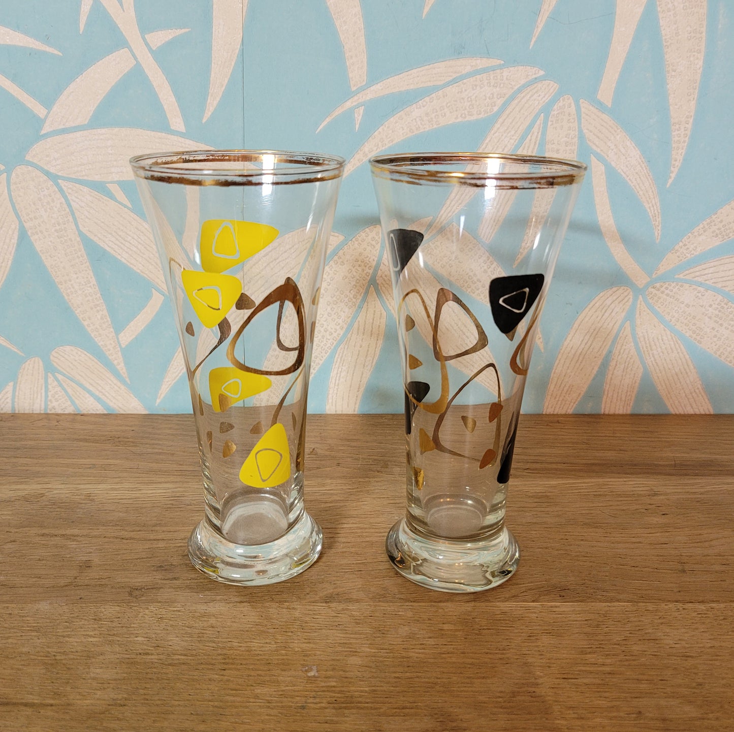 Pair of 1960s atomic boomerang pilsner glasses with gilt detail