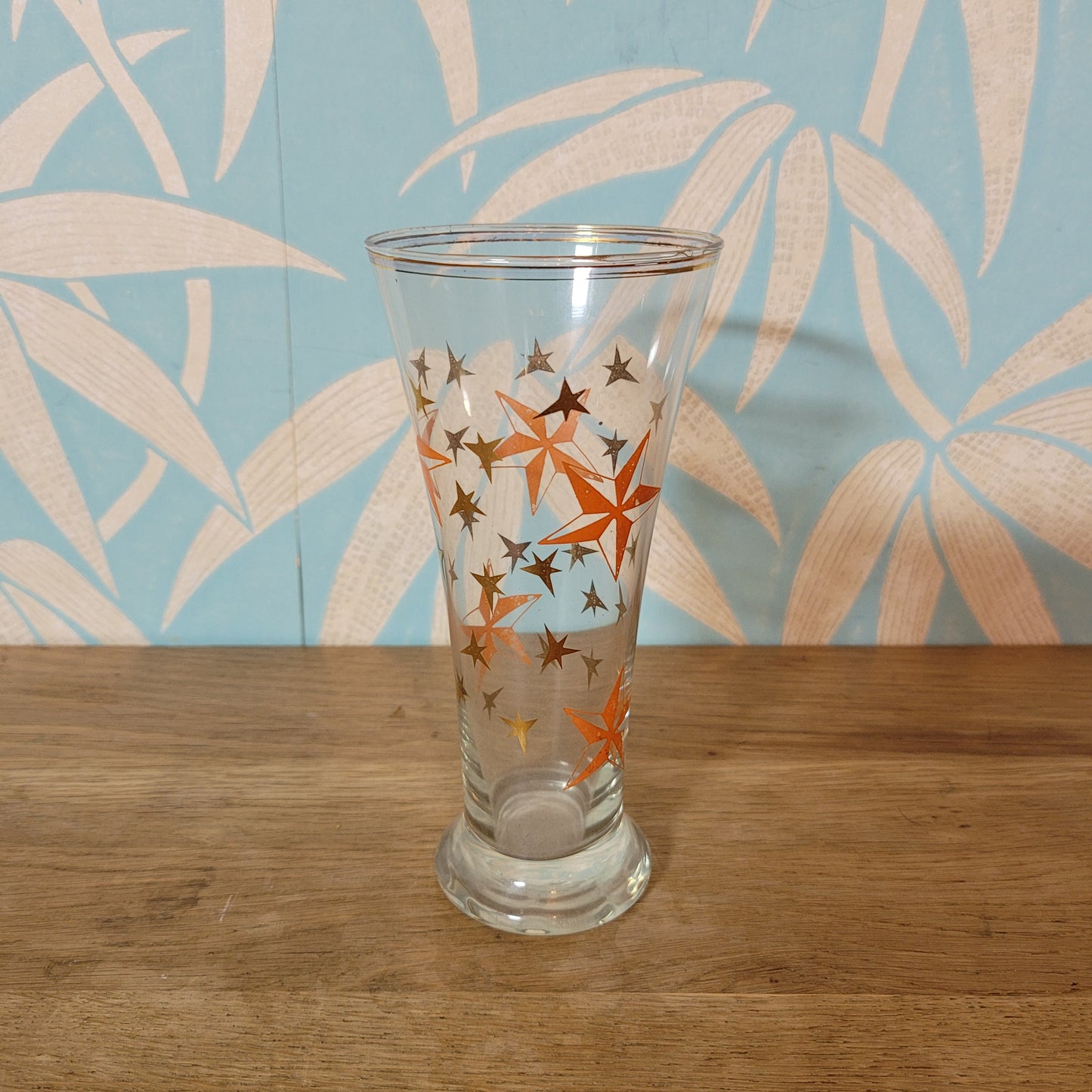 1960s atomic starburst pilsner glass with gilt rim
