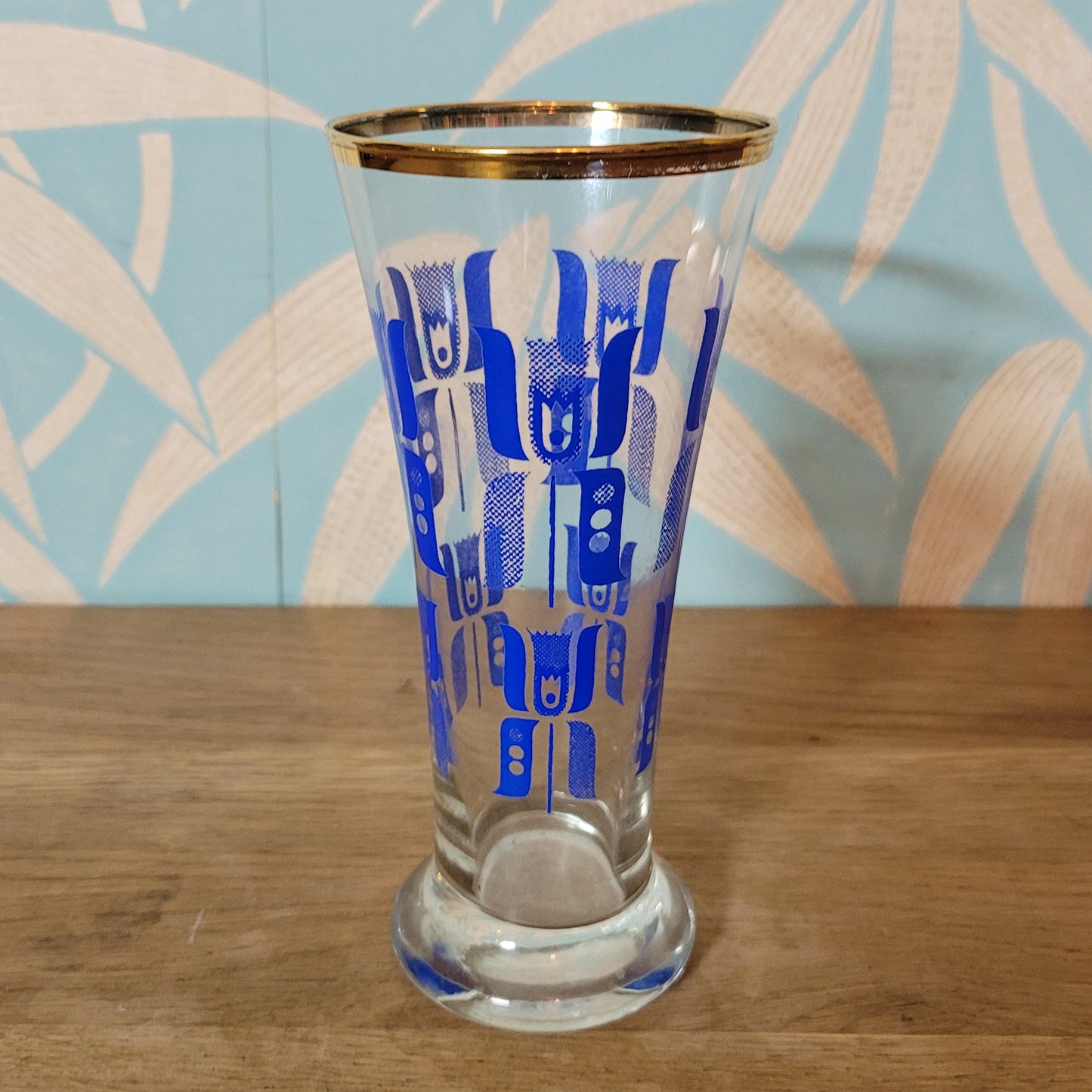 1960s blue abstract tulip pilsner glass with gilt rim