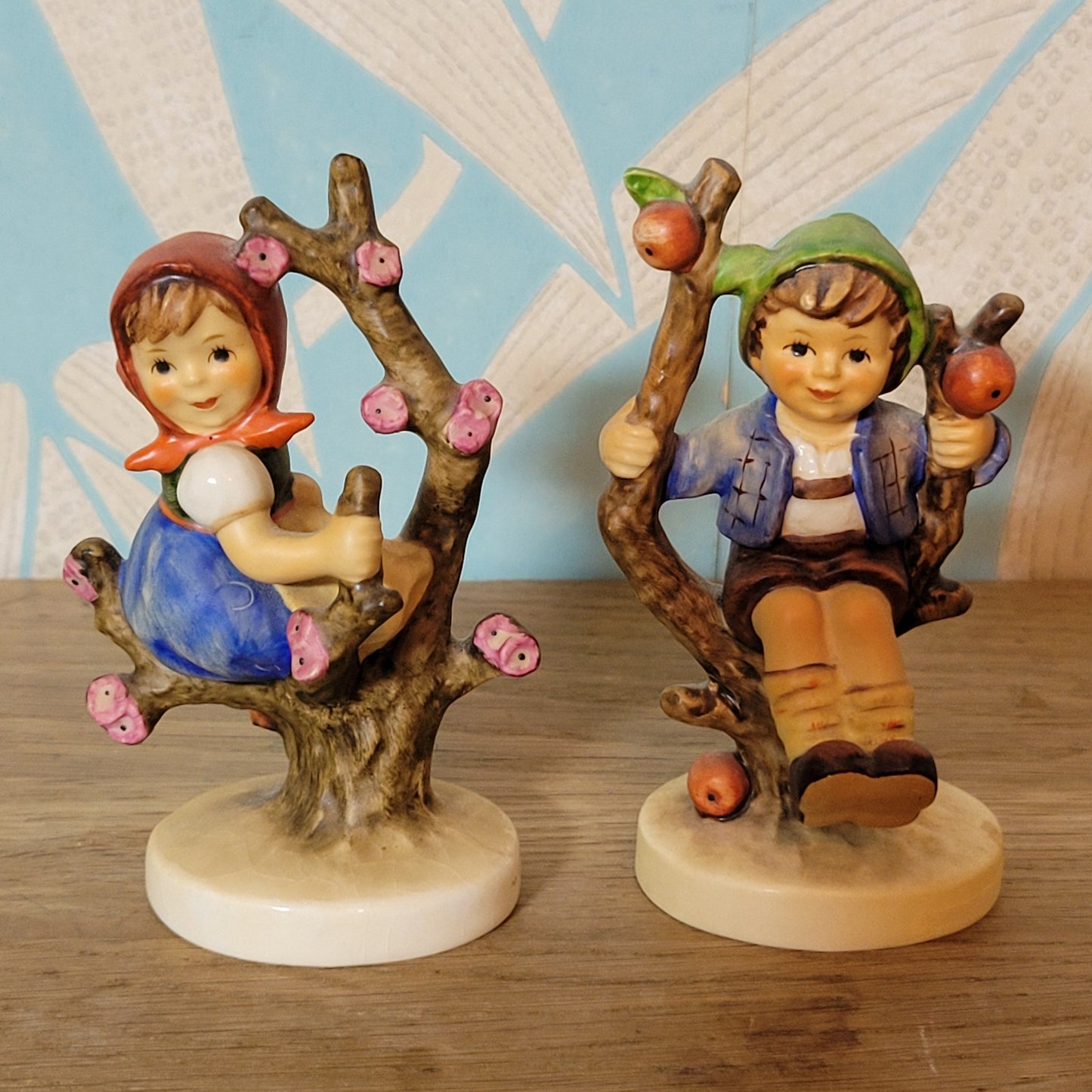 Pair of 1970s/80s Hummel "Apple Tree Girl" "Apple Tree Boy" porcelain figurines