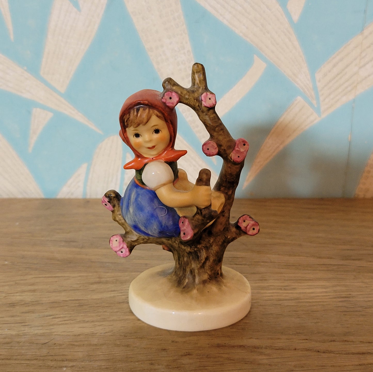 Pair of 1970s/80s Hummel "Apple Tree Girl" "Apple Tree Boy" porcelain figurines