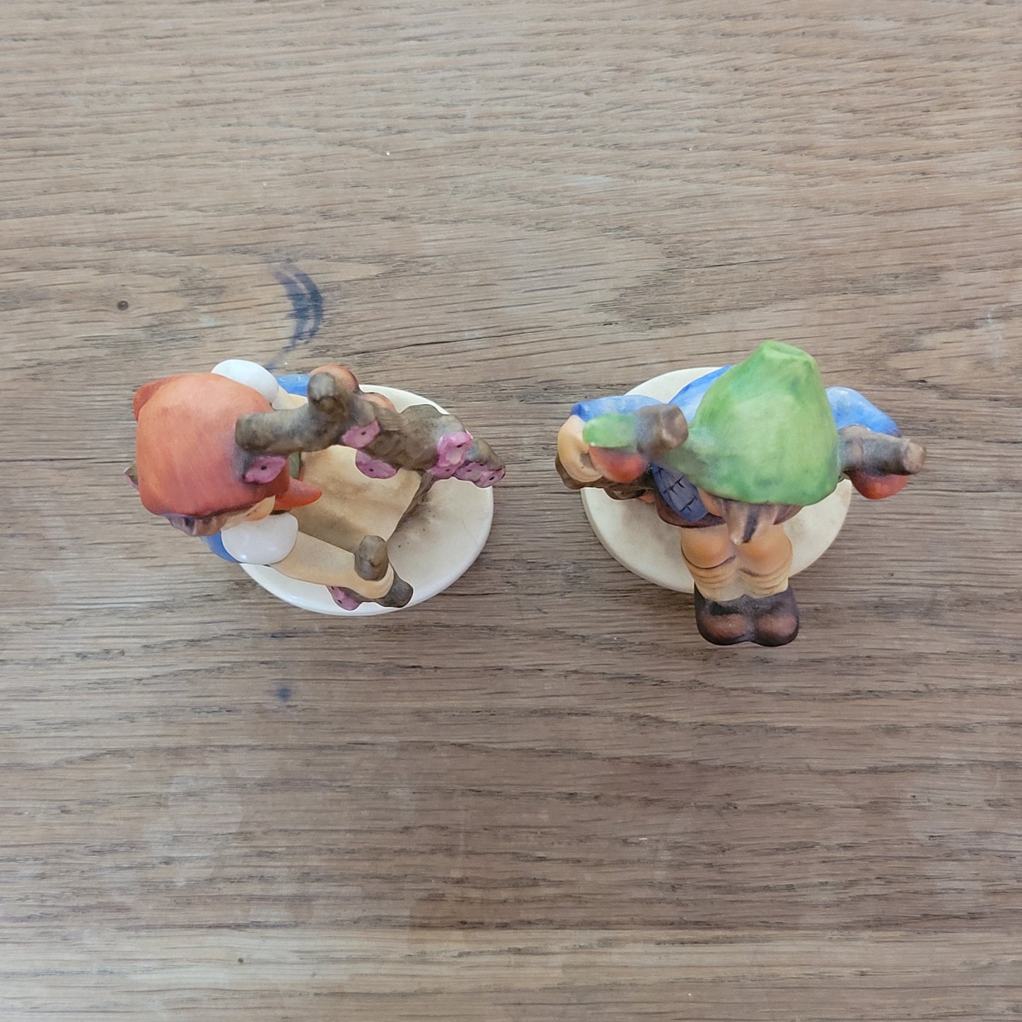 Pair of 1970s/80s Hummel "Apple Tree Girl" "Apple Tree Boy" porcelain figurines