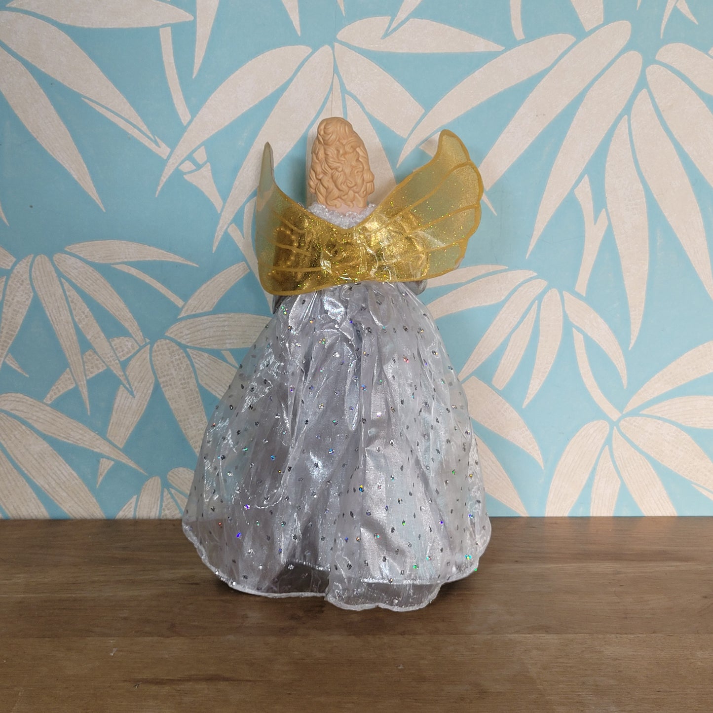 Vintage Christmas angel tree topper in silver dress with gold/silver wings