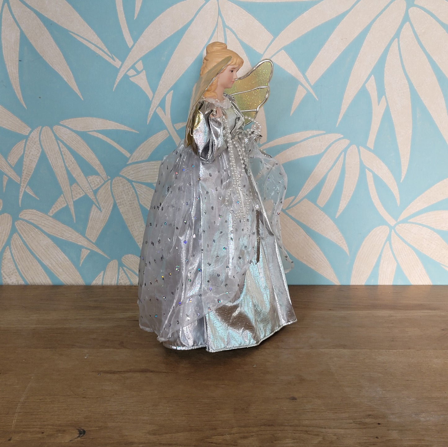 Vintage Christmas angel tree topper in silver dress with gold/silver wings