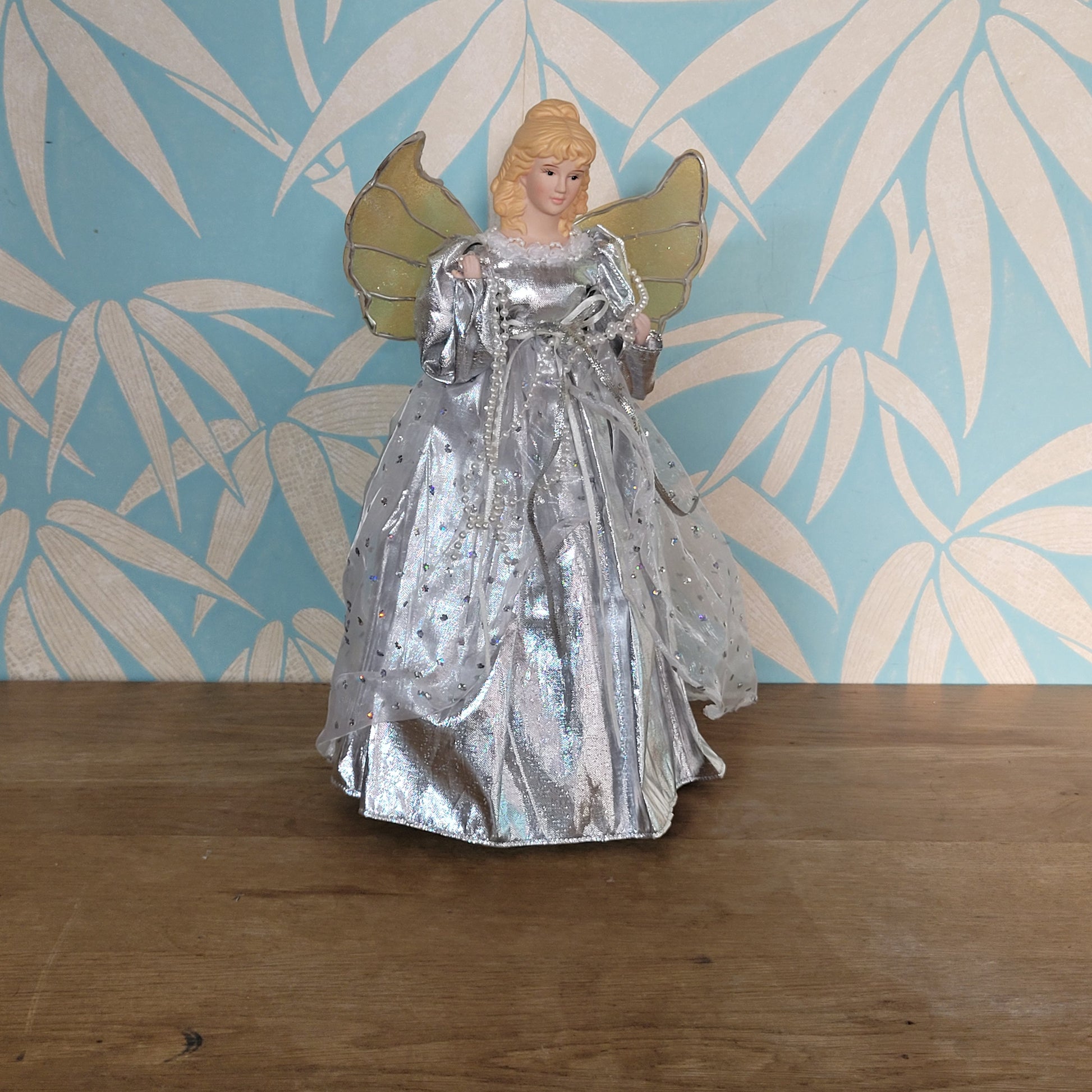 Vintage Christmas angel tree topper in silver dress with gold/silver wings