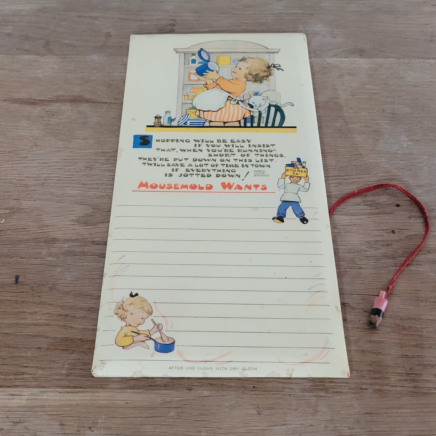 circa. 1940s/50s Lucy Mabel-Attwell illustrated "Household Wants" wipe-clean memo board