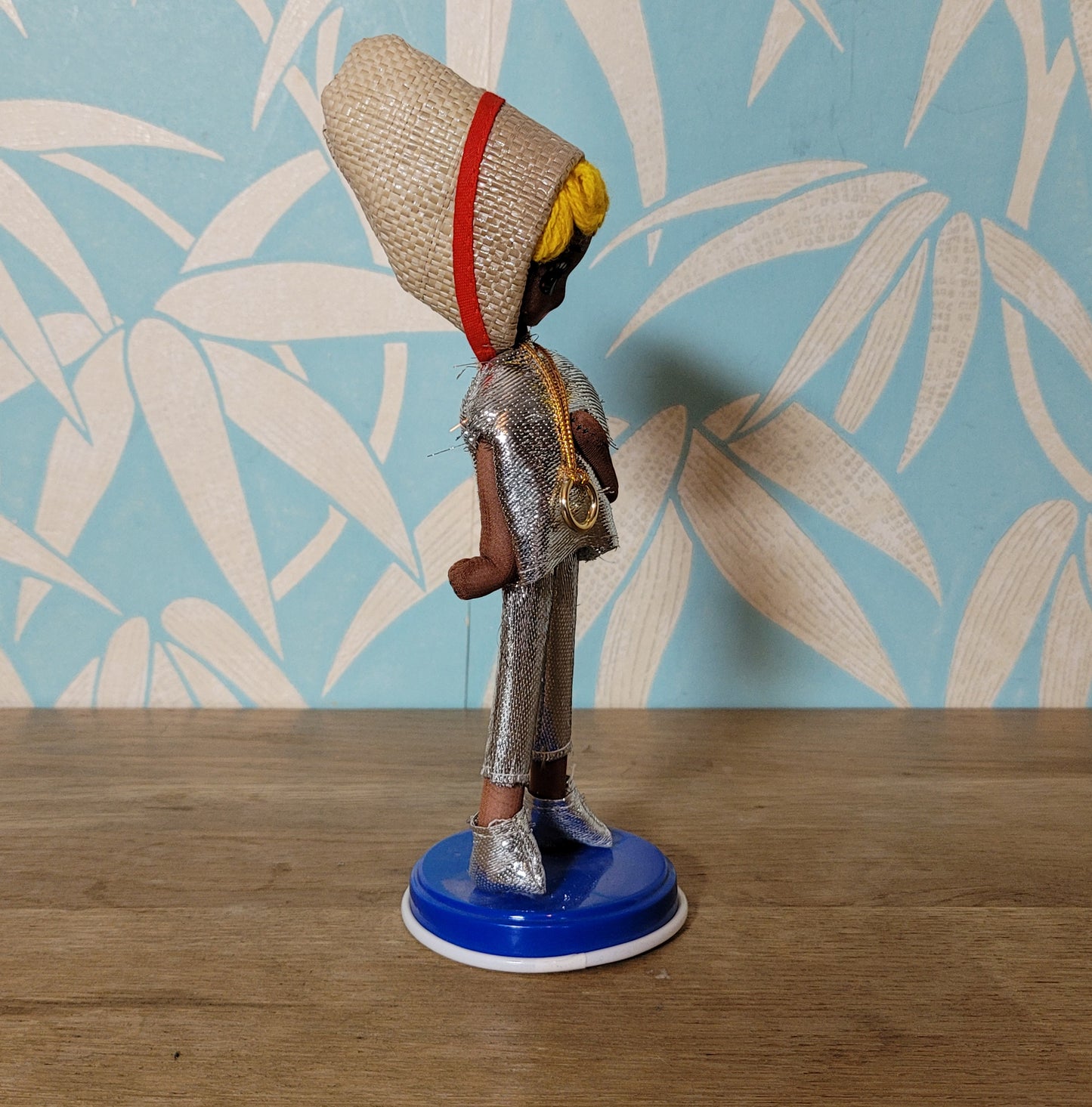 Pair of cute 1960s Bradley big eye pose dolls in co-ordinating metallic silver, & gold outfits